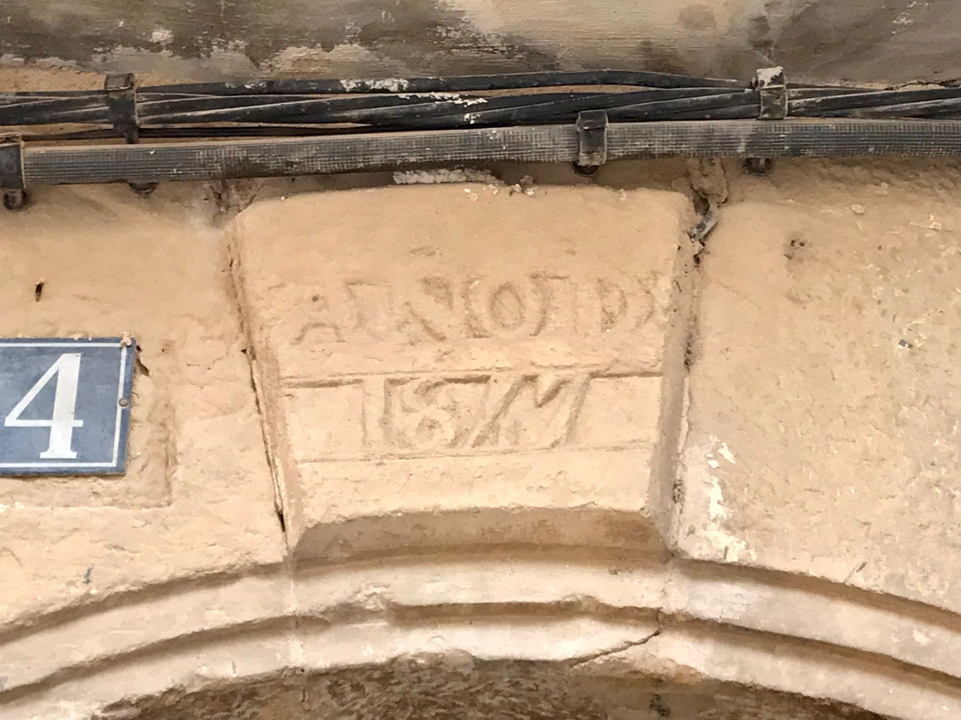 woman wearing yellow long-sleeved dress under white clouds and blue sky during daytime