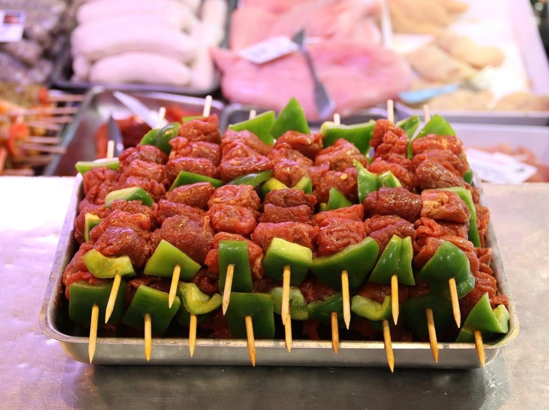 woman wearing yellow long-sleeved dress under white clouds and blue sky during daytime