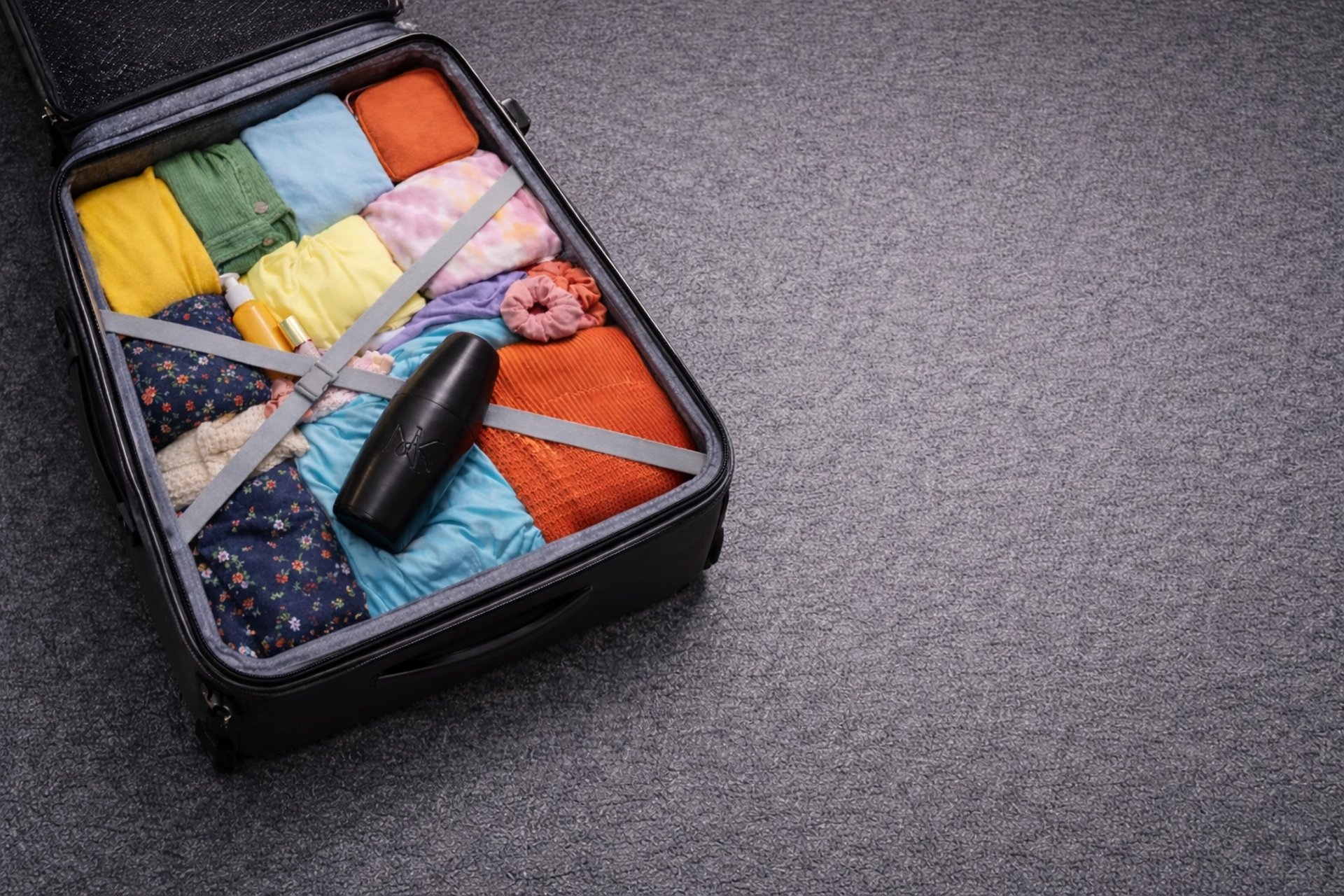 an abstract photo of a curved building with a blue sky in the background