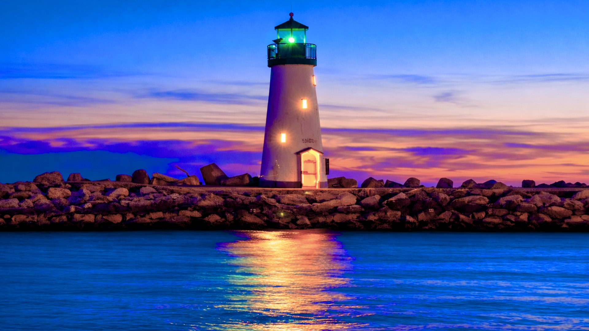 a lighthouse on a rocky shore