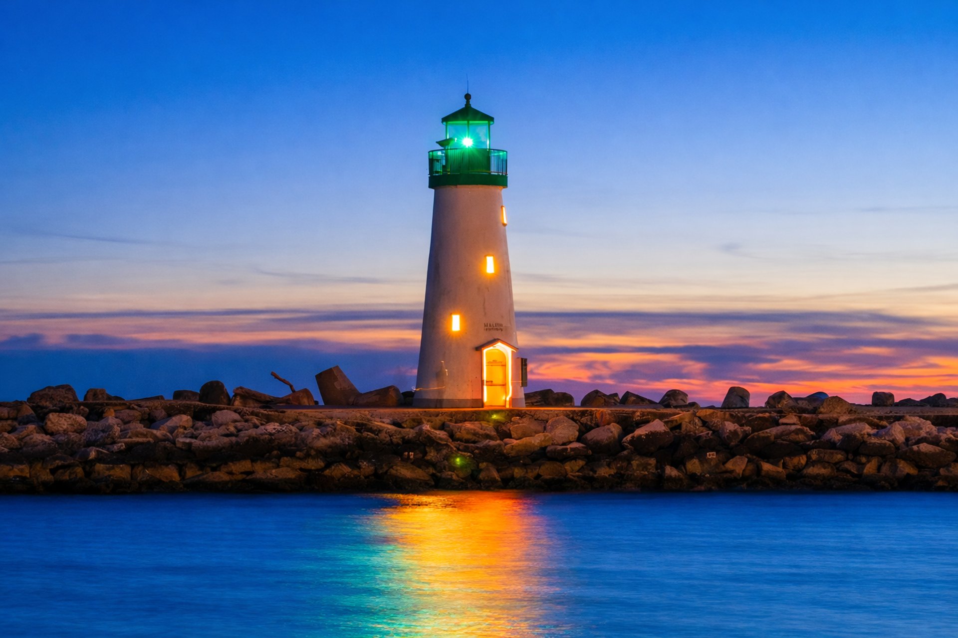 a lighthouse on a rocky shore