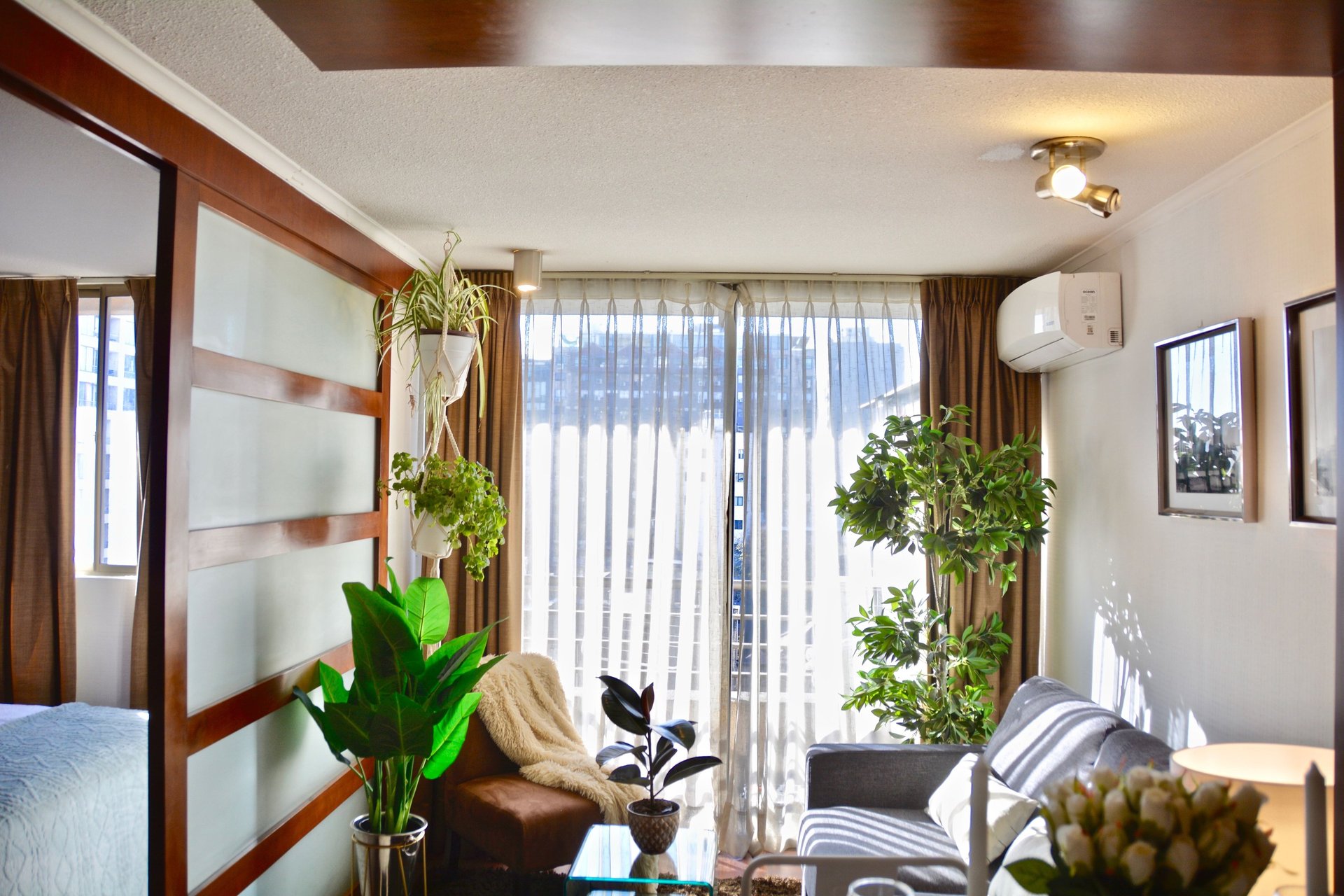 woman wearing yellow long-sleeved dress under white clouds and blue sky during daytime