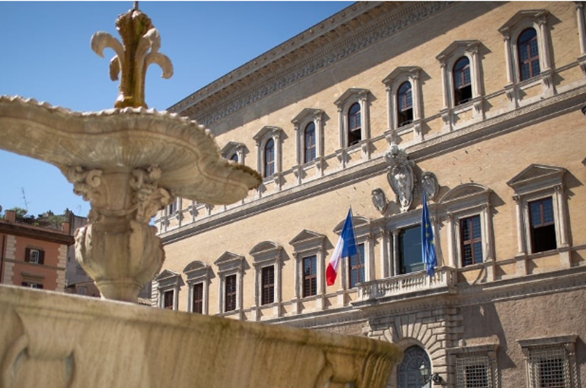 woman wearing yellow long-sleeved dress under white clouds and blue sky during daytime