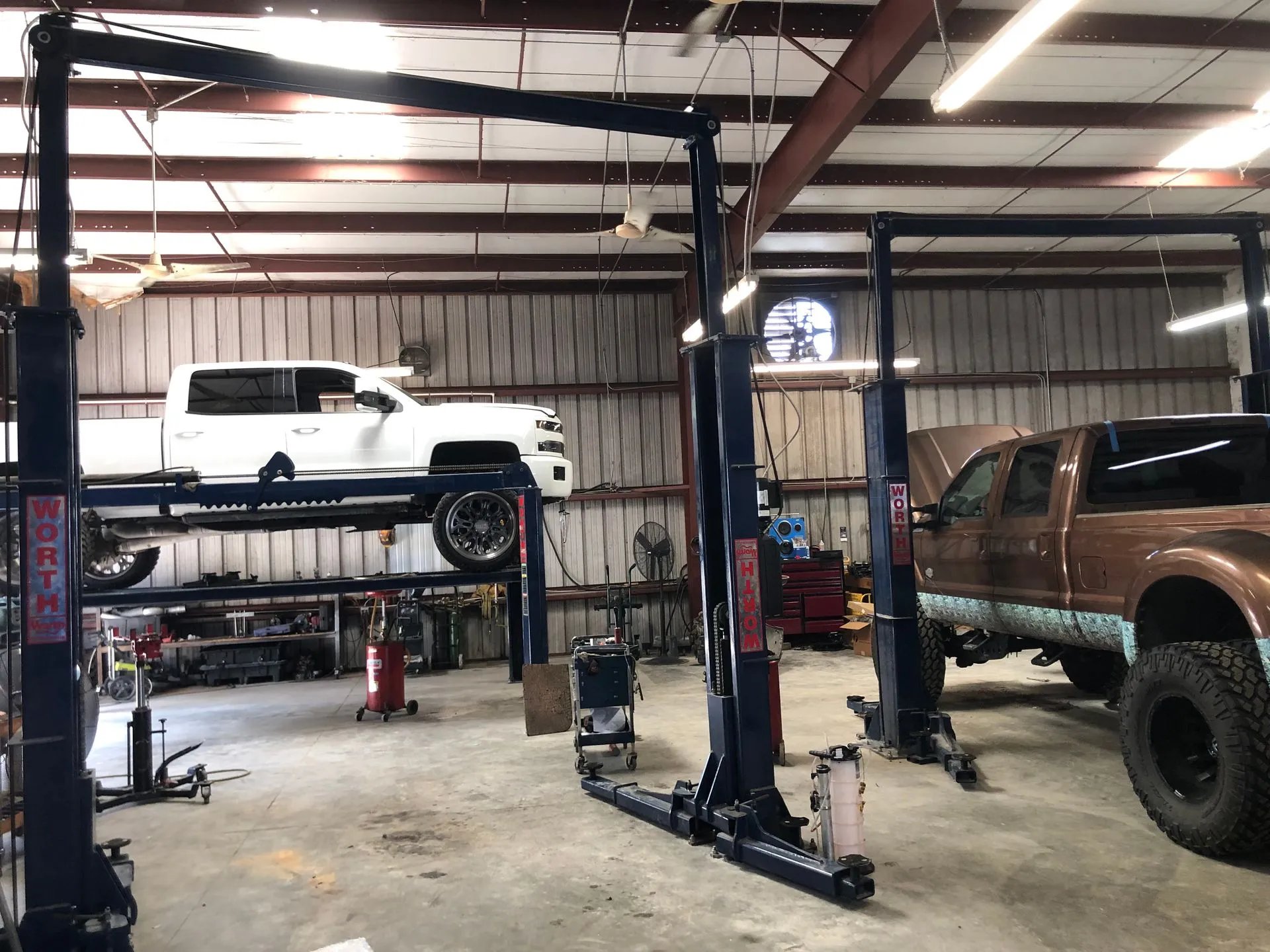 black and brown leather padded tub sofa