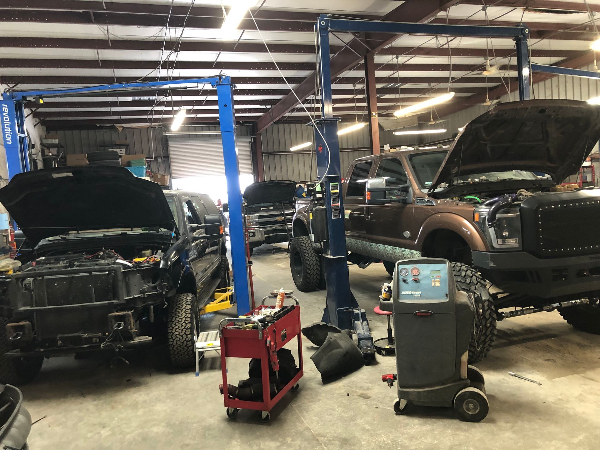 black and brown leather padded tub sofa