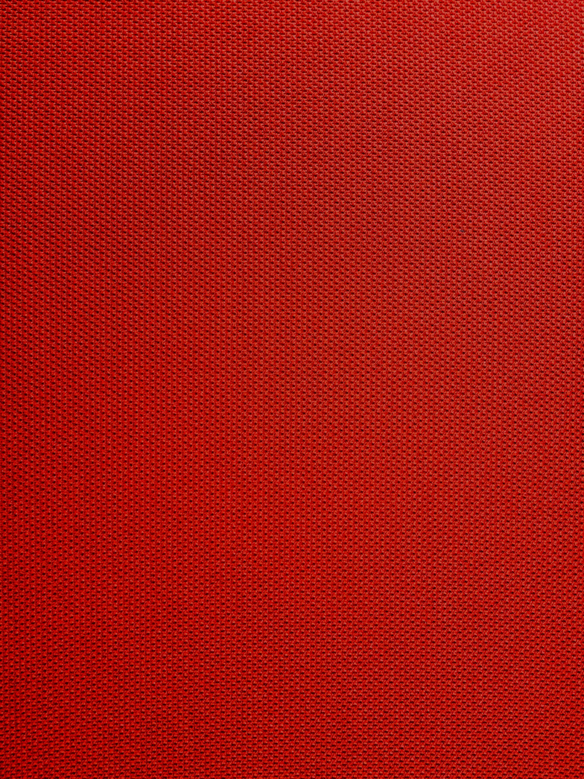 red textile in close up photography