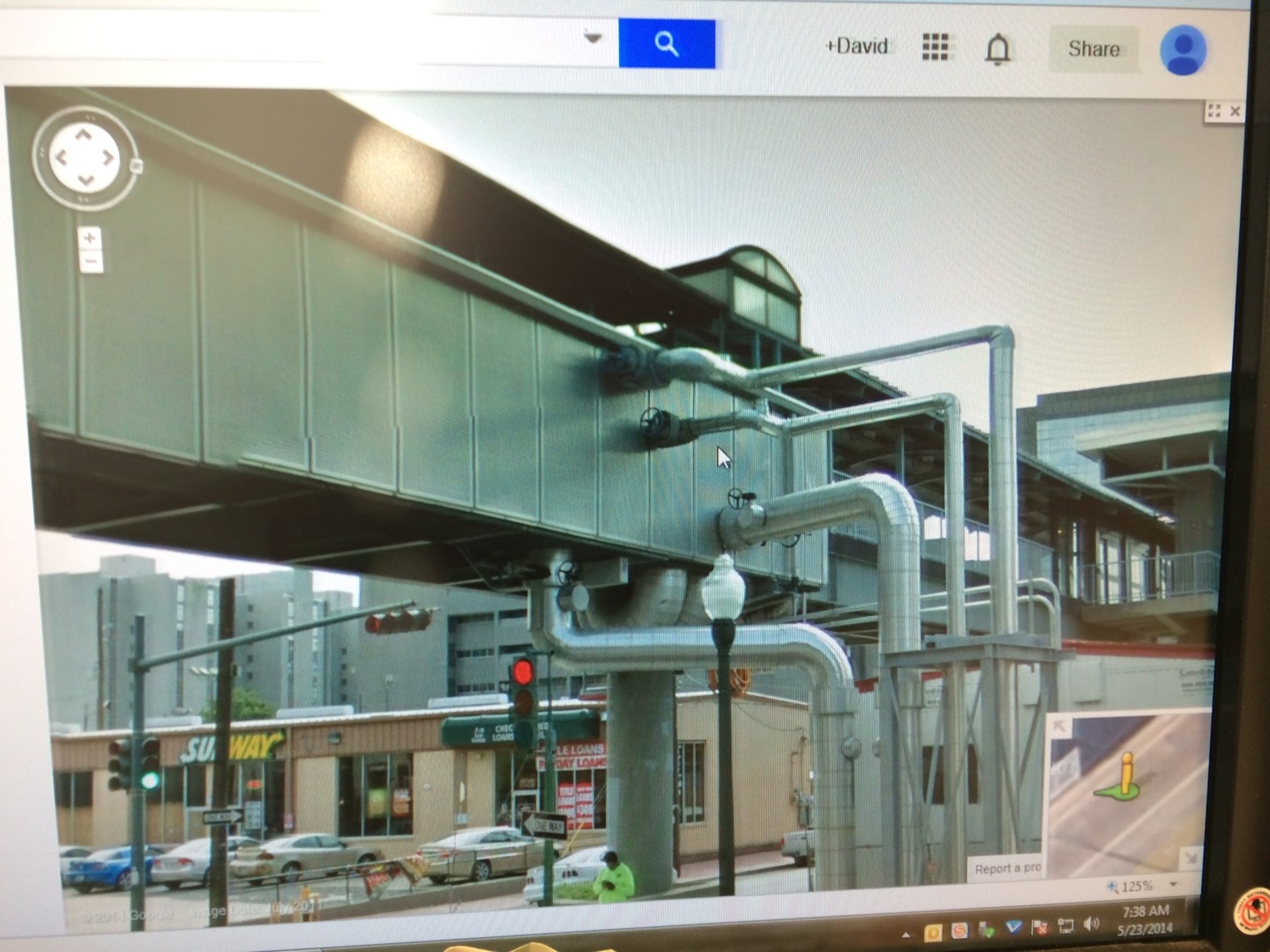 black and brown leather padded tub sofa