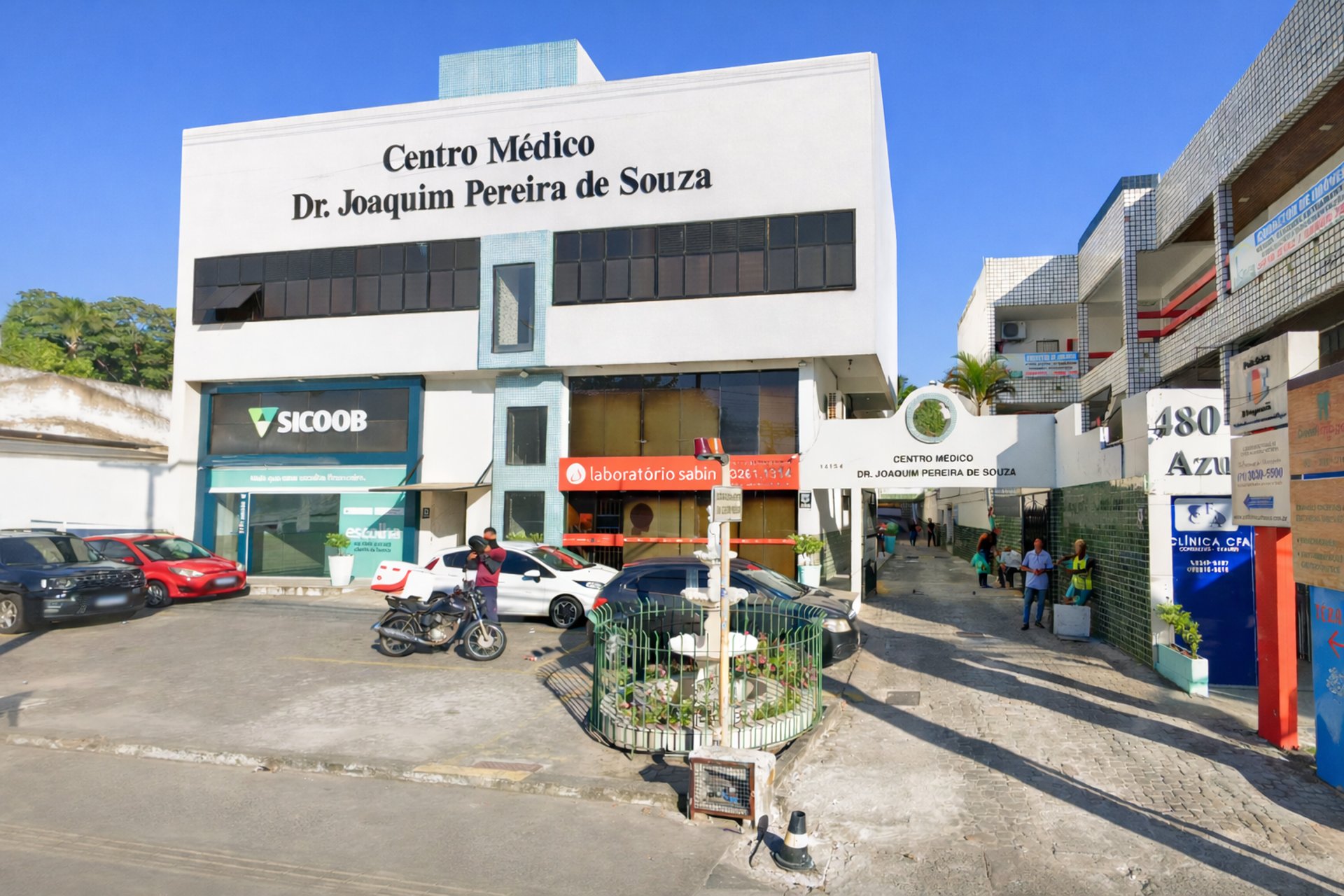 woman wearing yellow long-sleeved dress under white clouds and blue sky during daytime