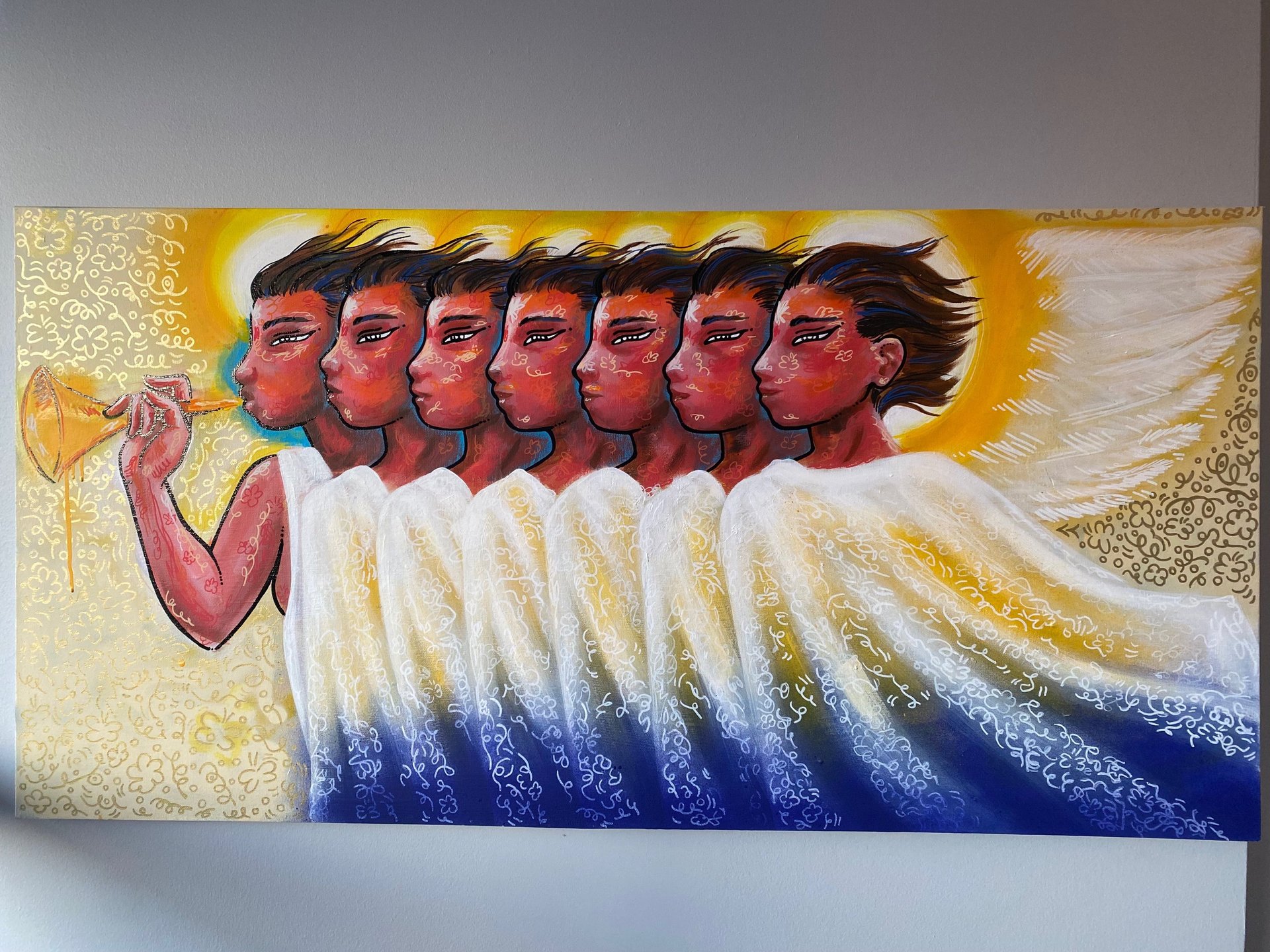 an abstract photo of a curved building with a blue sky in the background