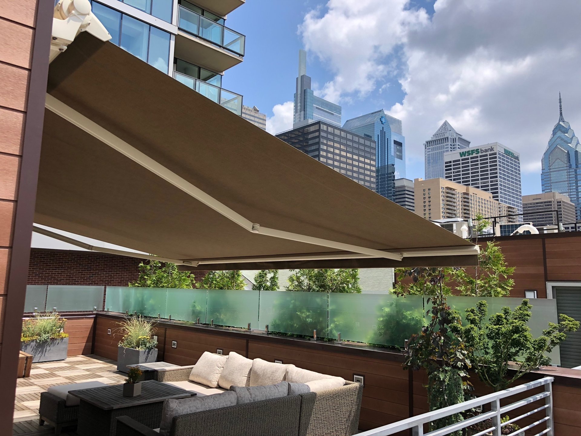 black and brown leather padded tub sofa