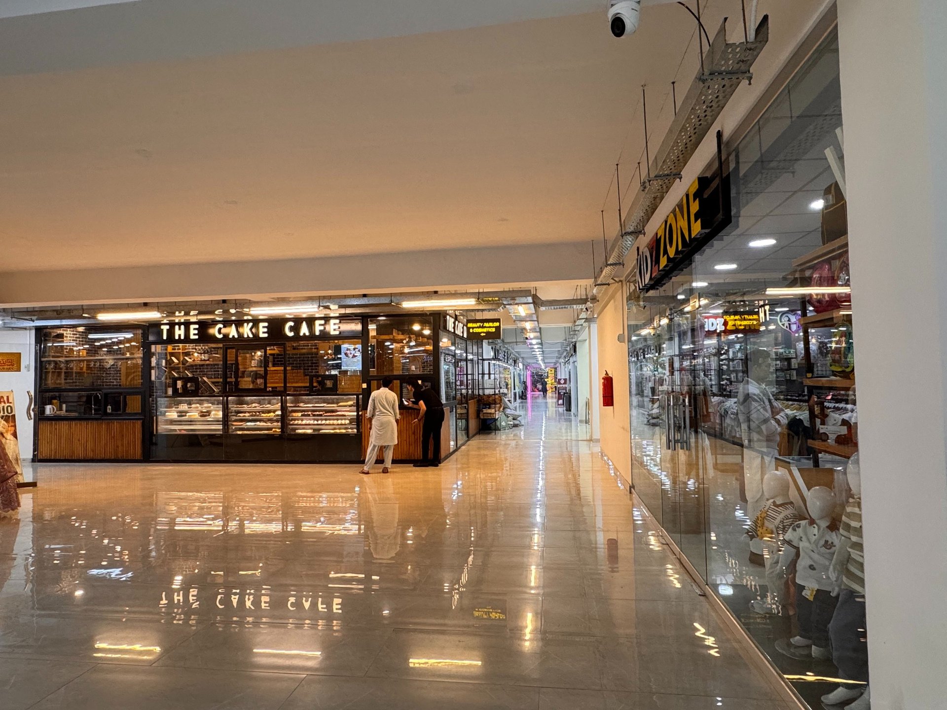 woman wearing yellow long-sleeved dress under white clouds and blue sky during daytime