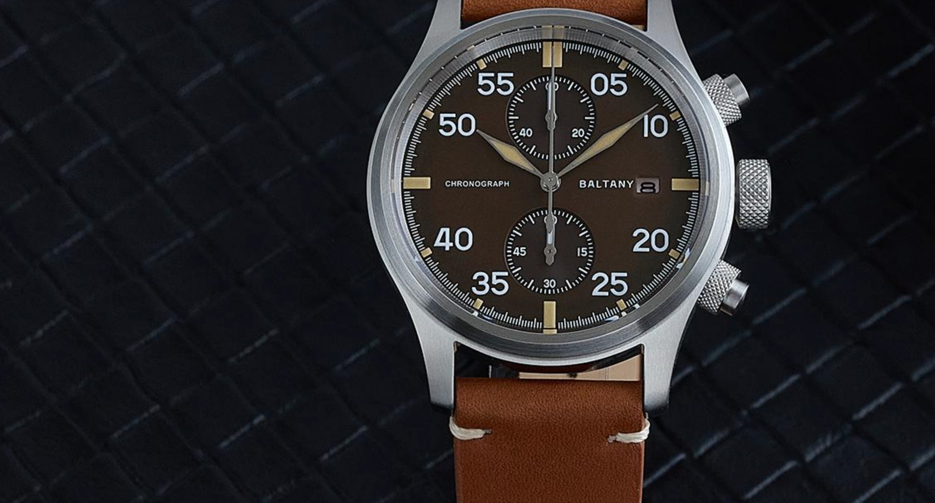 person wearing grey knit sweater