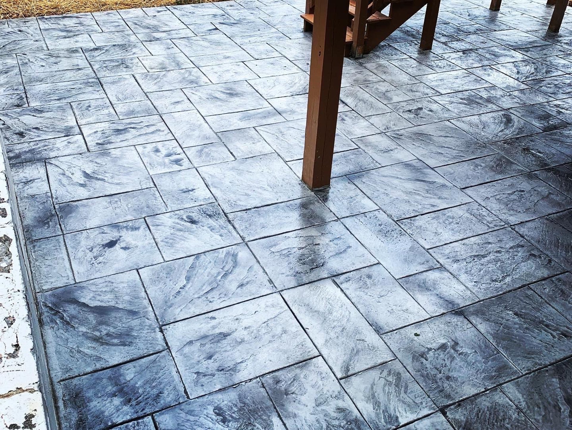 an abstract photo of a curved building with a blue sky in the background