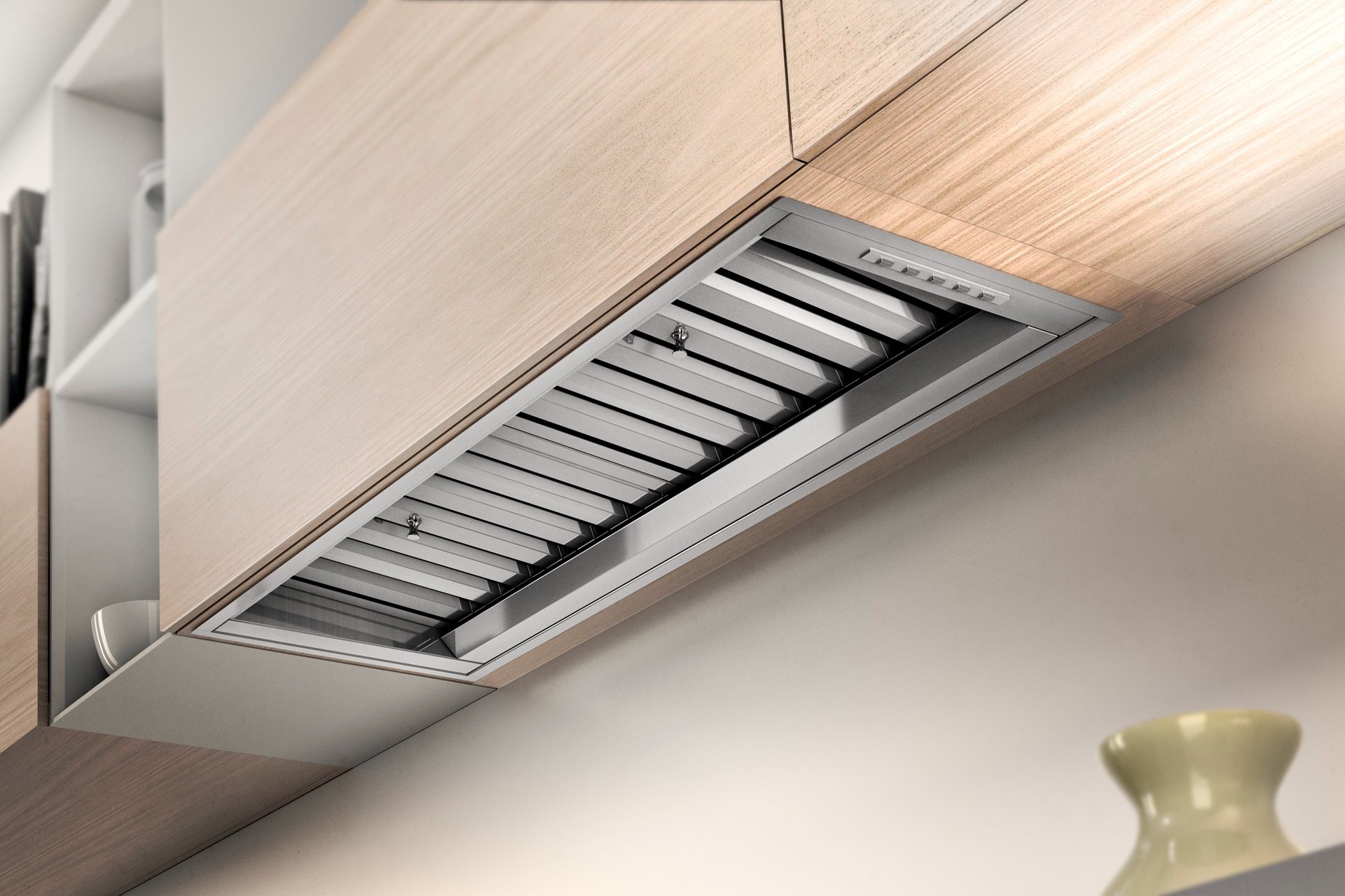 an abstract photo of a curved building with a blue sky in the background