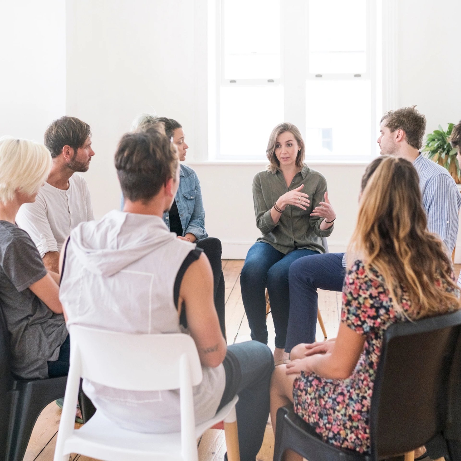 an abstract photo of a curved building with a blue sky in the background