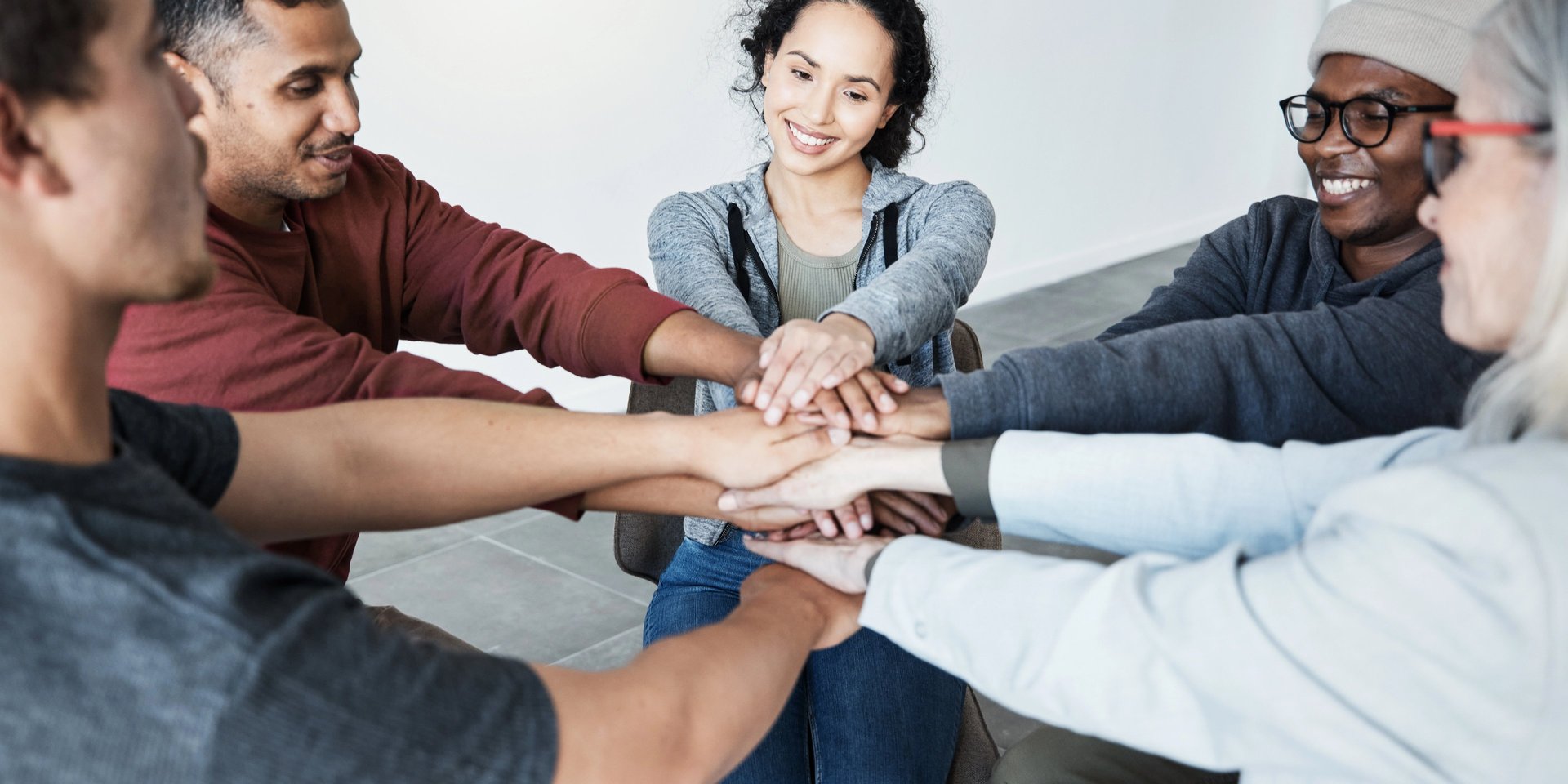 an abstract photo of a curved building with a blue sky in the background