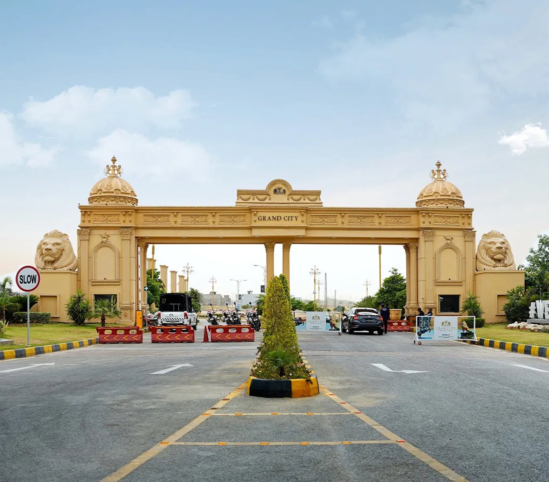 an abstract photo of a curved building with a blue sky in the background