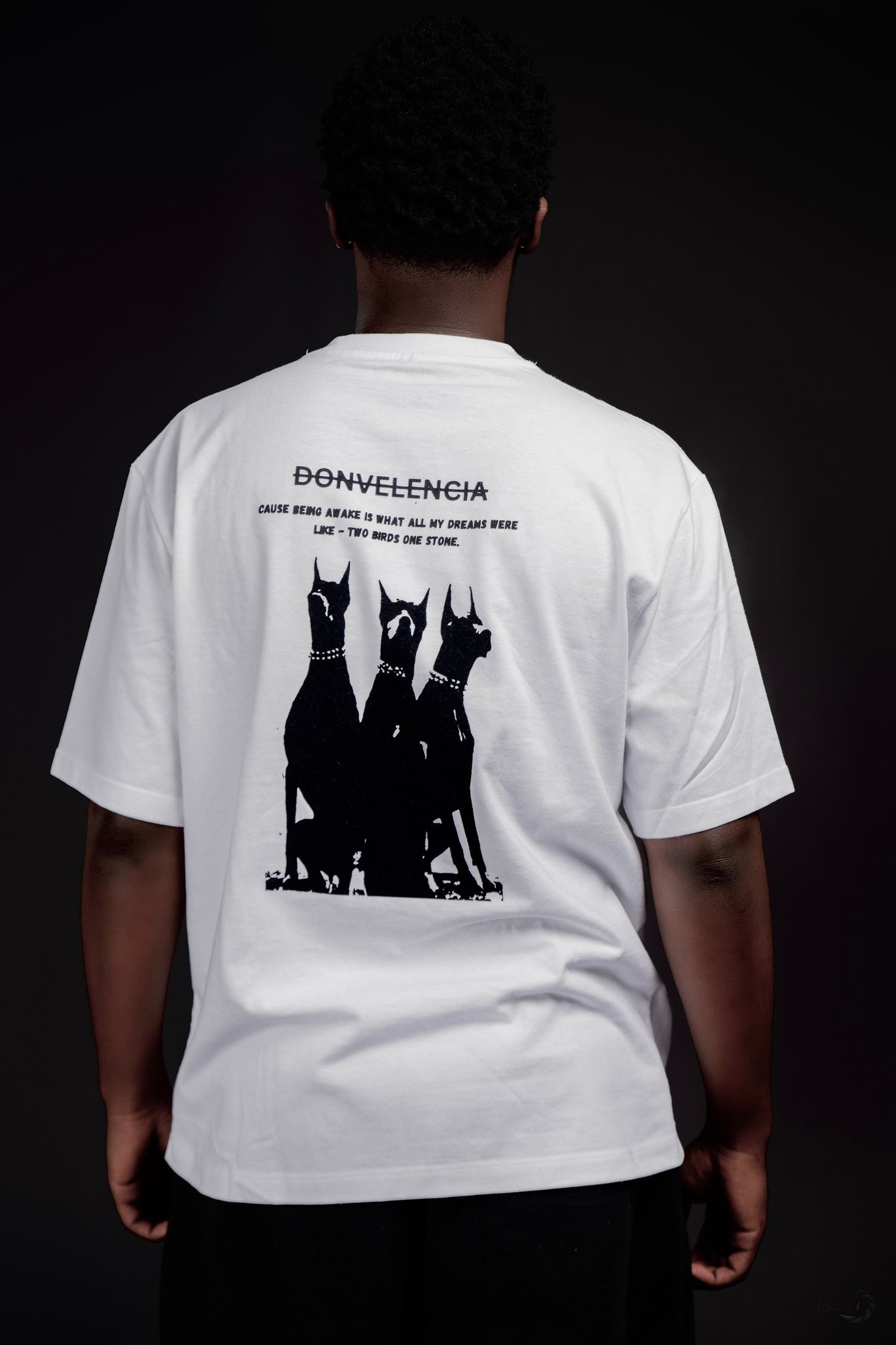 a close up of a person wearing a necklace