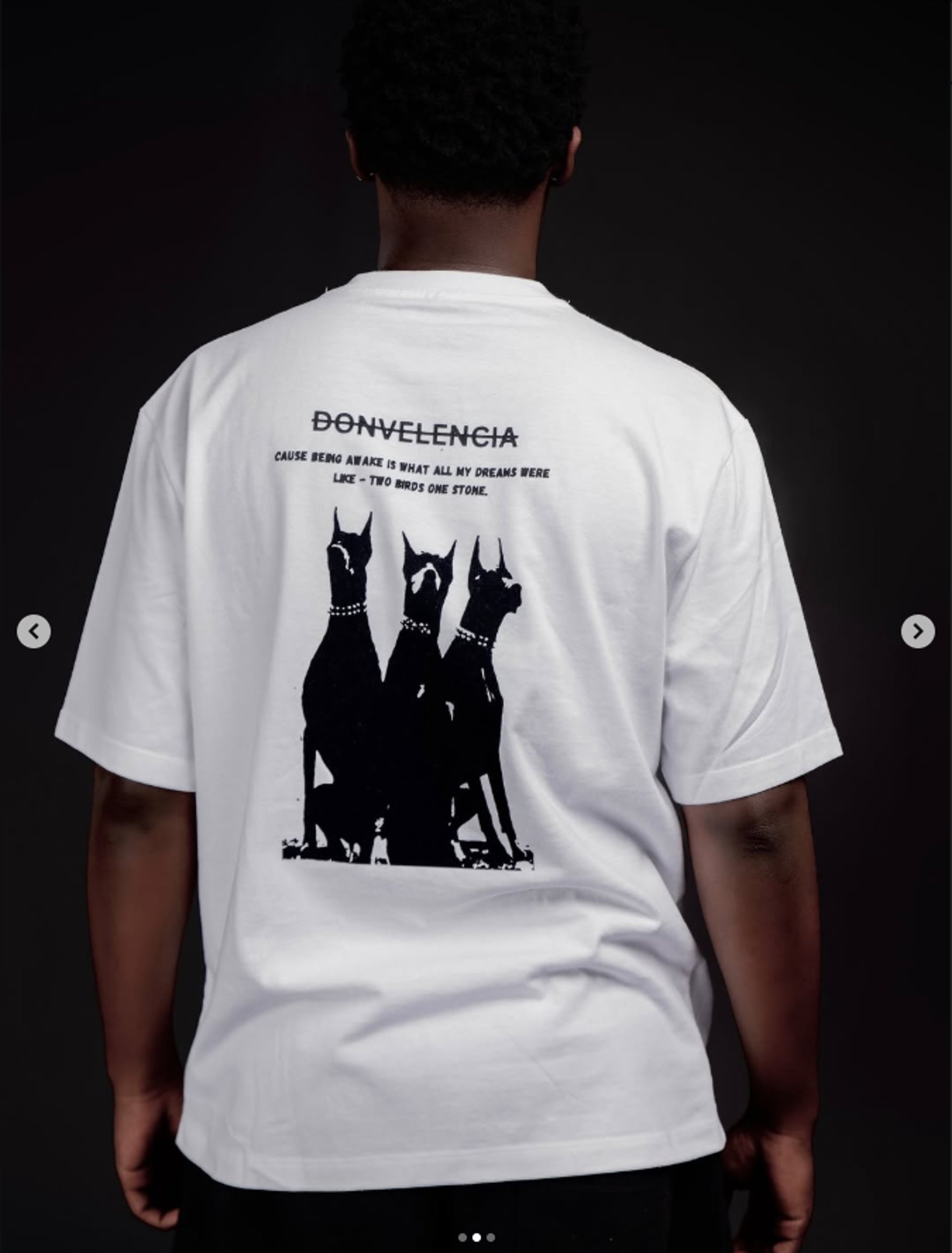 a close up of a person wearing a necklace