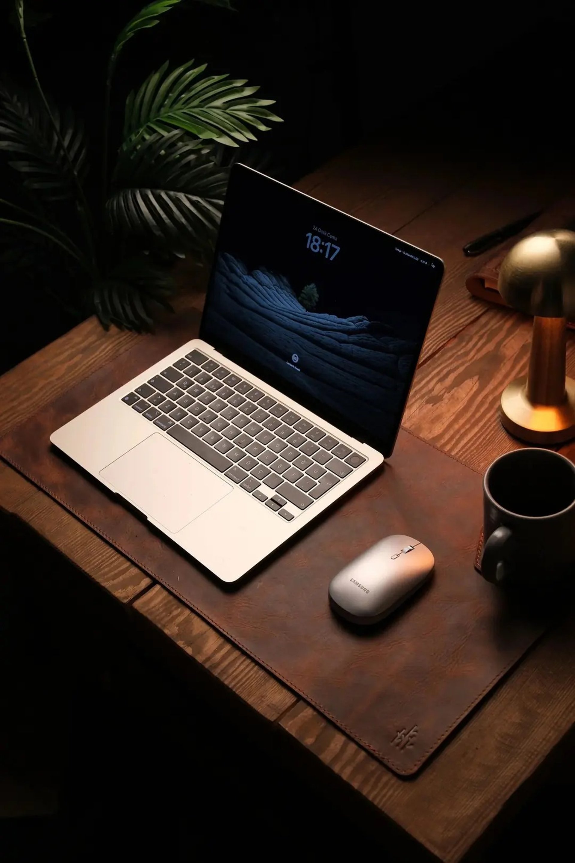 macbook pro on white table