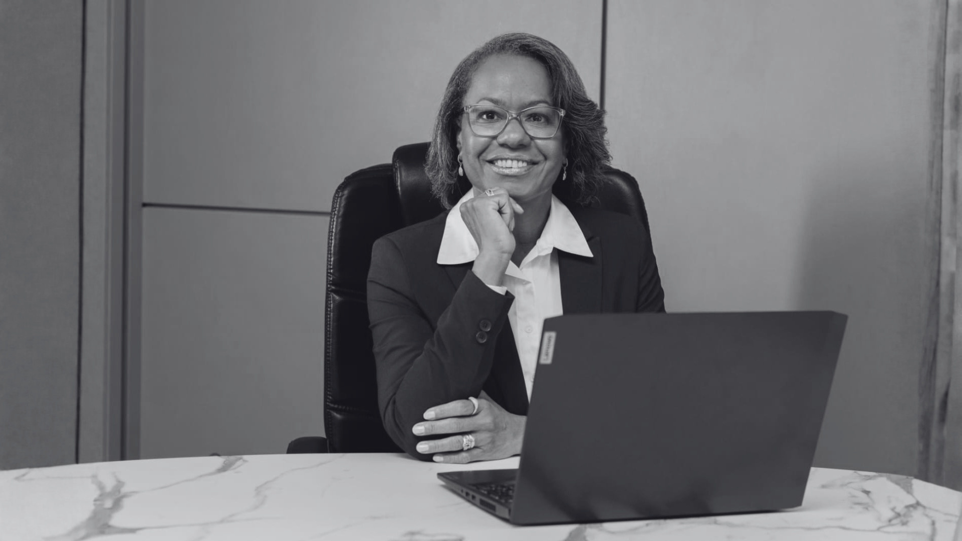 an abstract photo of a curved building with a blue sky in the background