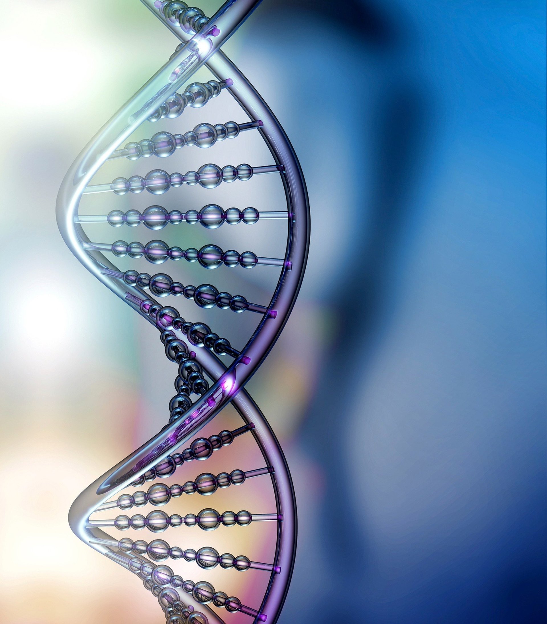 A tall metal spiral on top of a wooden floor