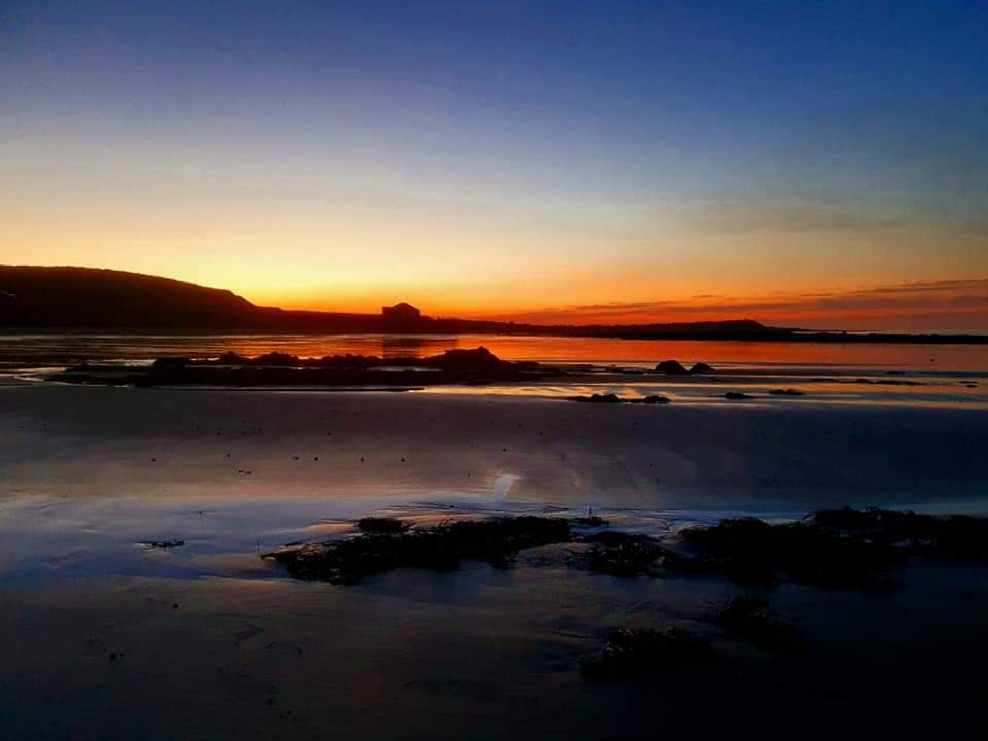 mountain range under blue sky