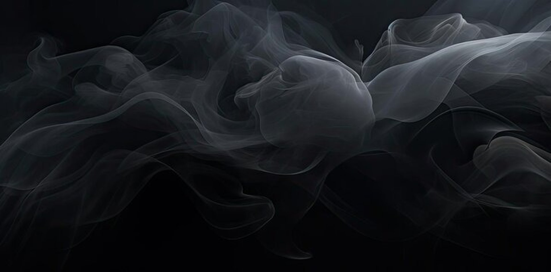 the night sky with stars above a mountain