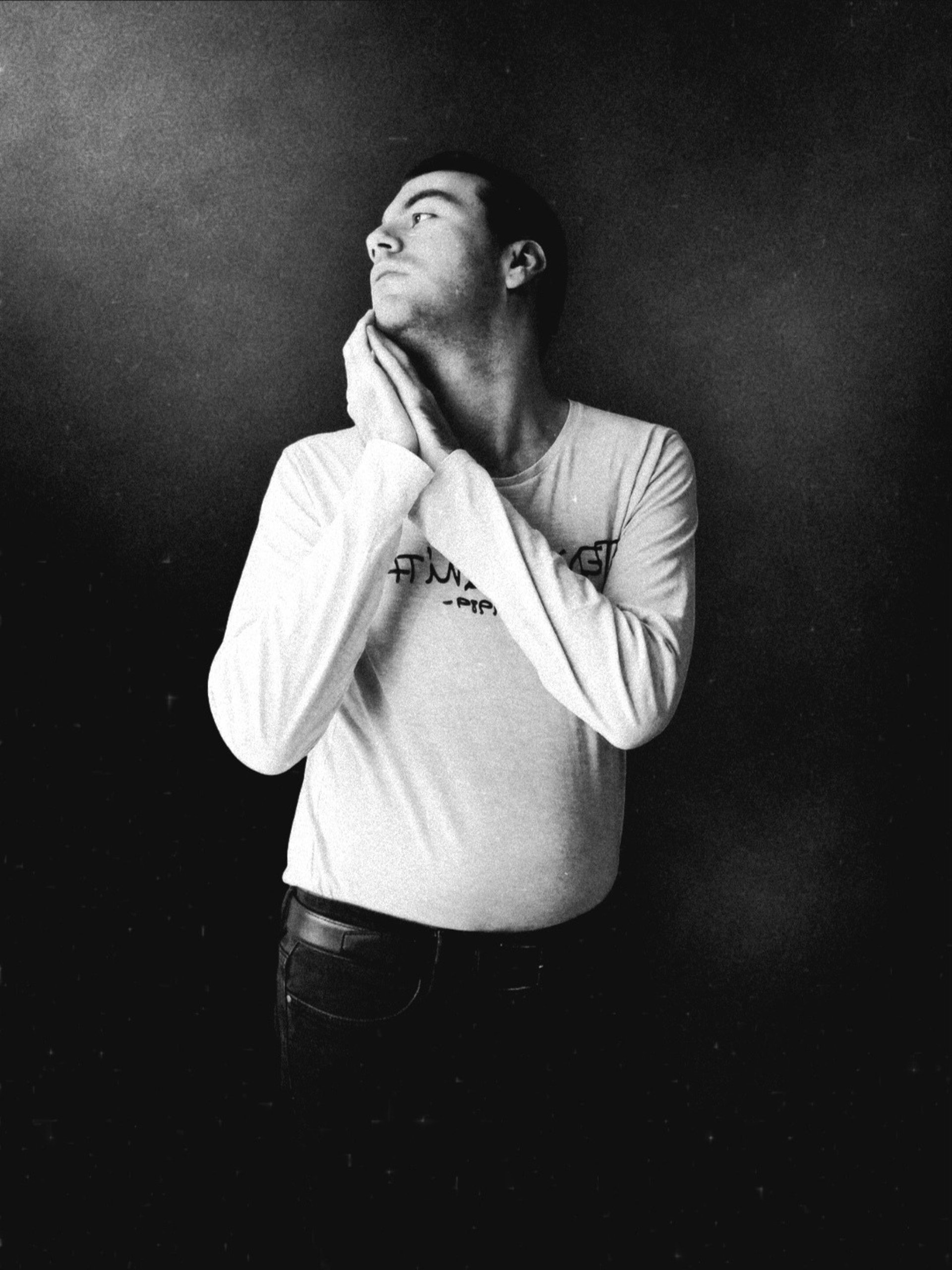 an abstract photo of a curved building with a blue sky in the background