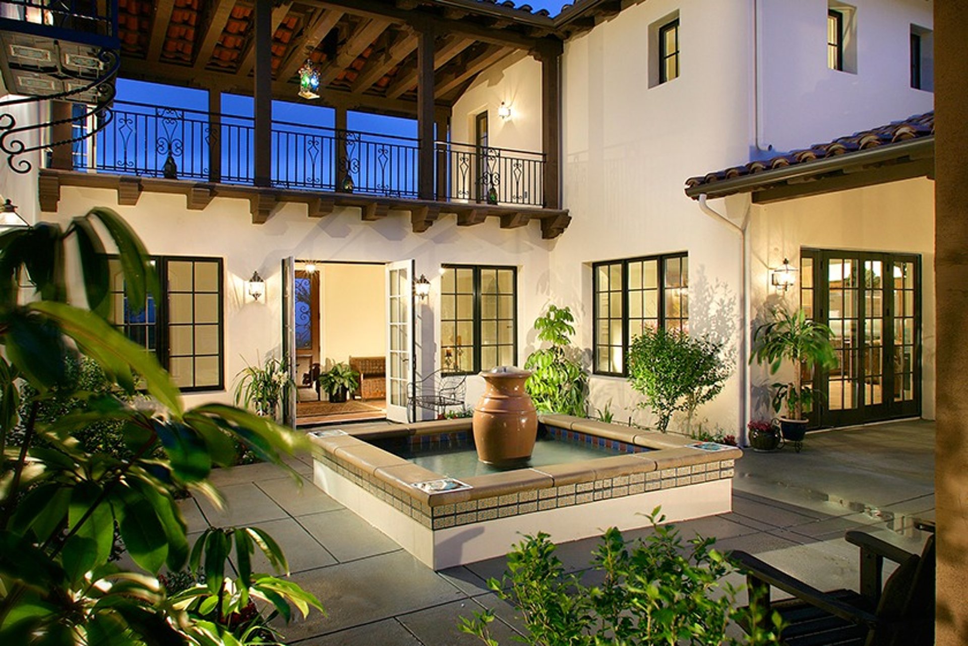 black and brown leather padded tub sofa