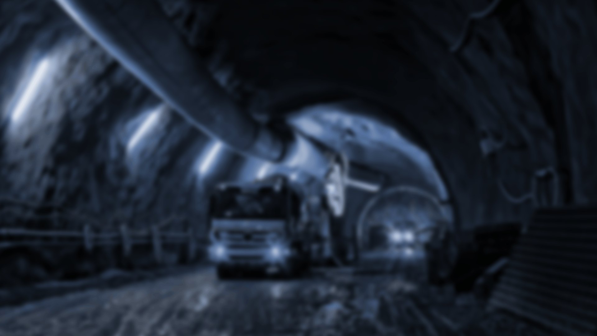 an abstract photo of a curved building with a blue sky in the background