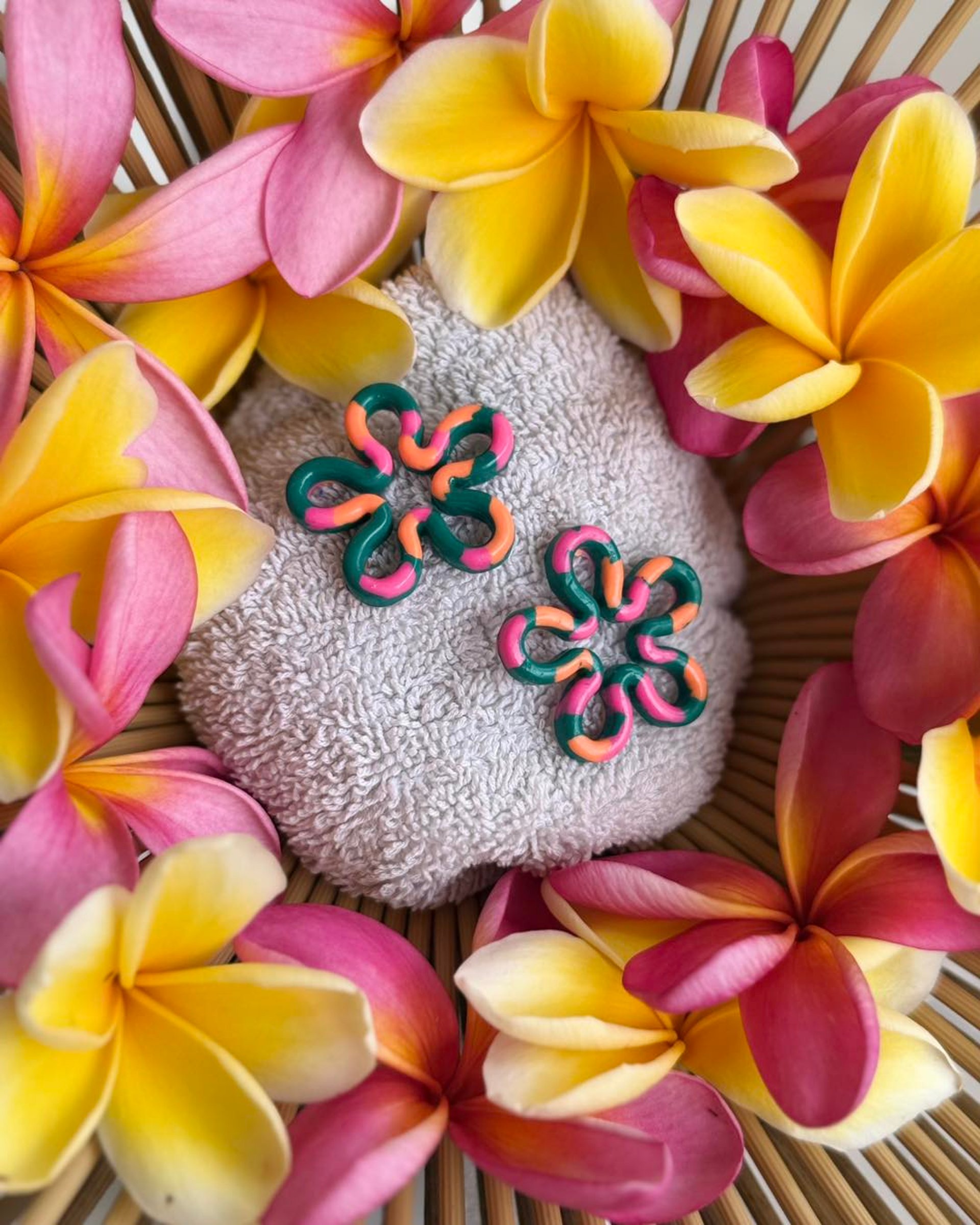 an abstract photo of a curved building with a blue sky in the background