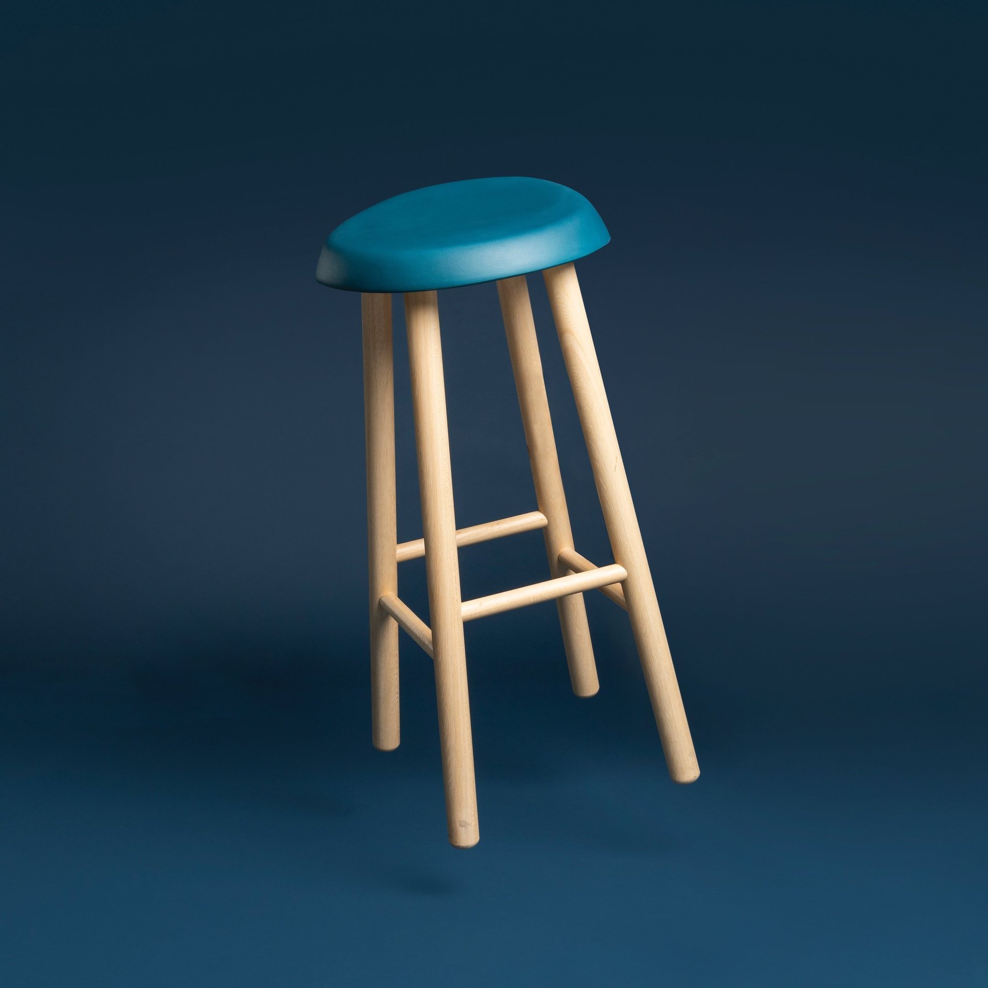 man in green crew neck t-shirt wearing black framed eyeglasses