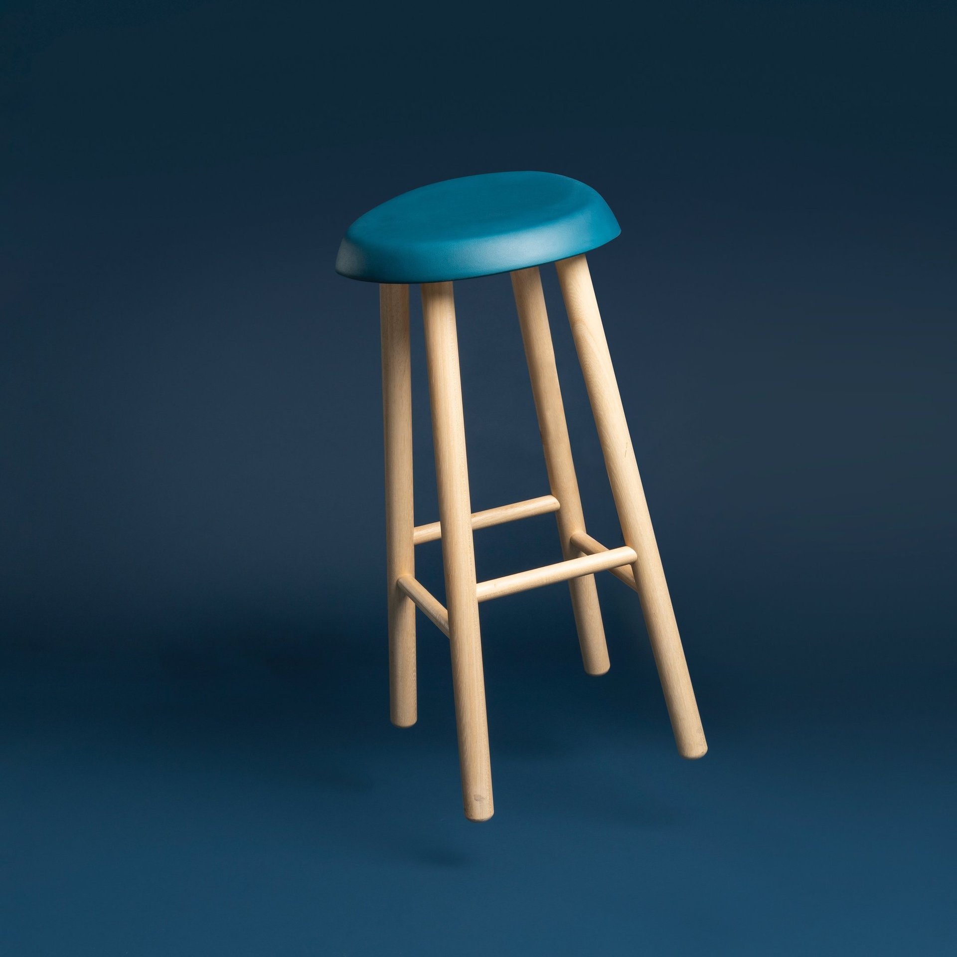 man in green crew neck t-shirt wearing black framed eyeglasses