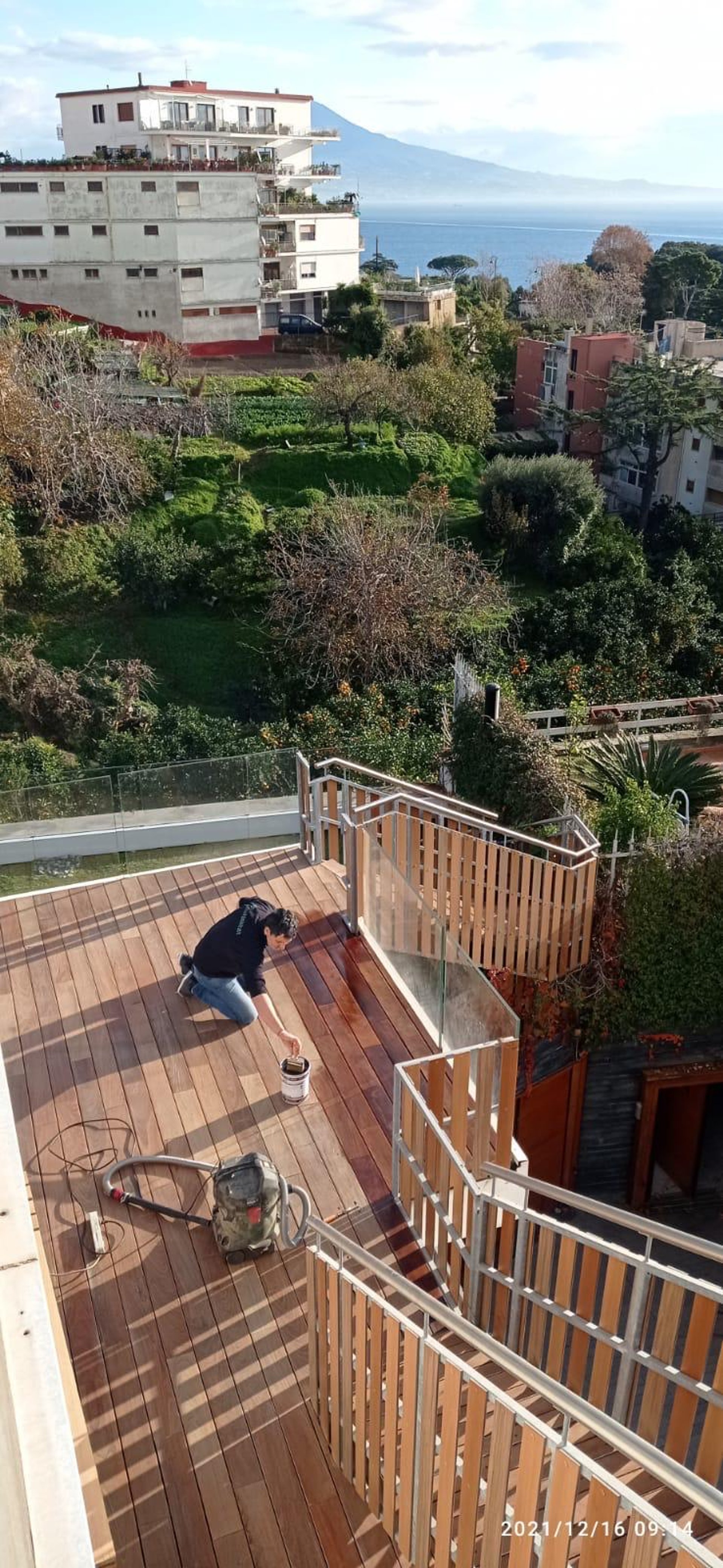 A living room with a couch a table and chairs