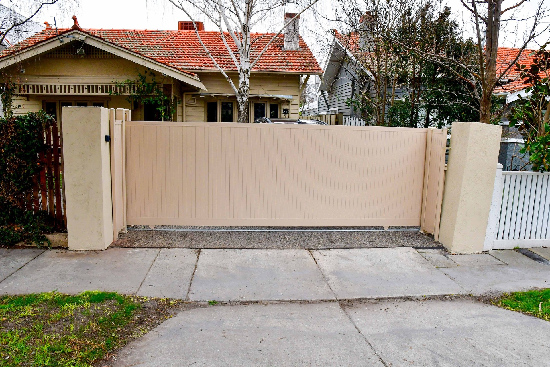 an abstract photo of a curved building with a blue sky in the background
