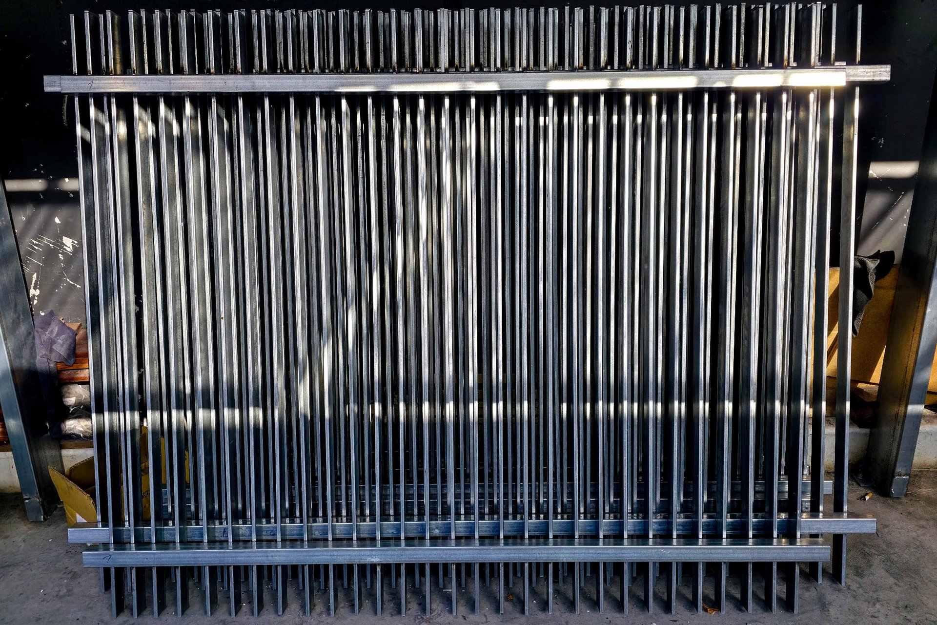 an abstract photo of a curved building with a blue sky in the background