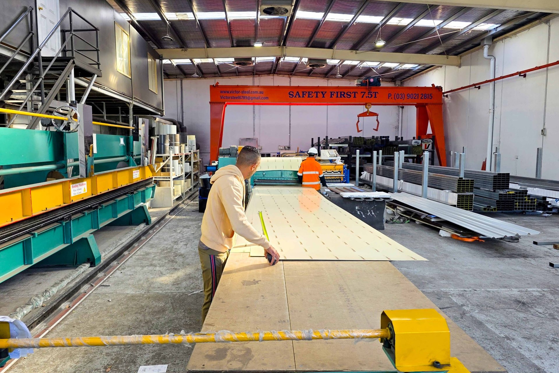 an abstract photo of a curved building with a blue sky in the background