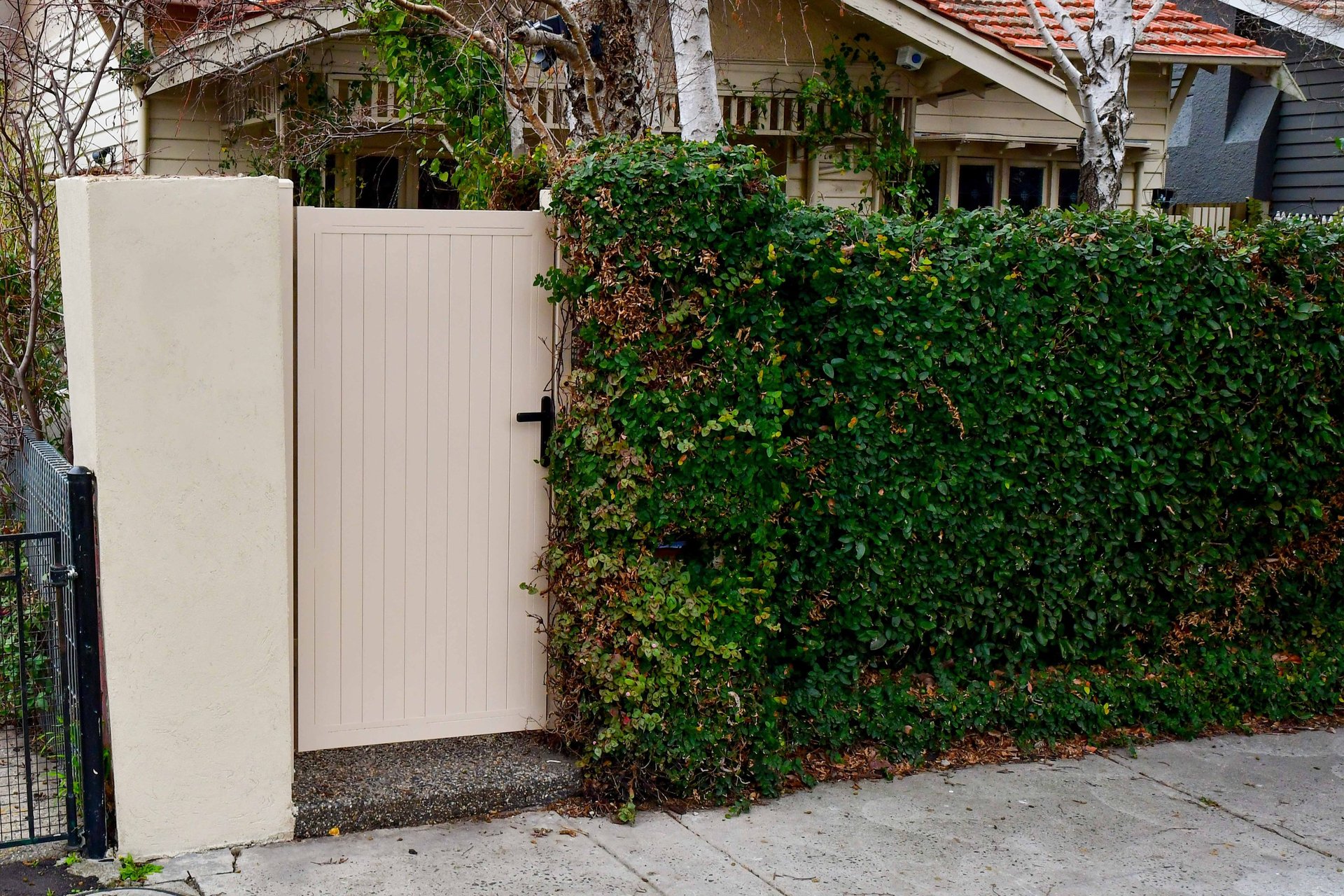 an abstract photo of a curved building with a blue sky in the background