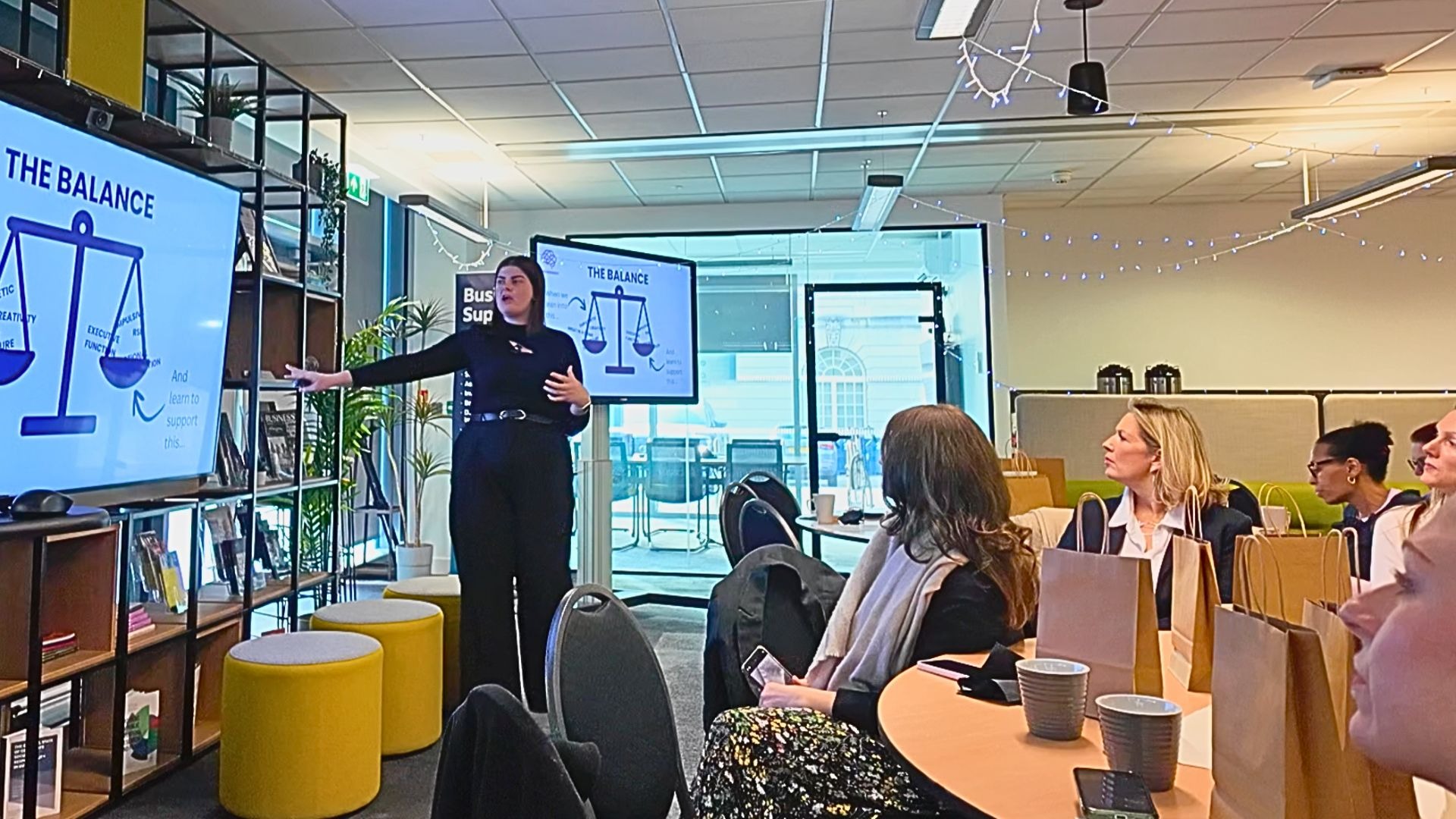 an abstract photo of a curved building with a blue sky in the background