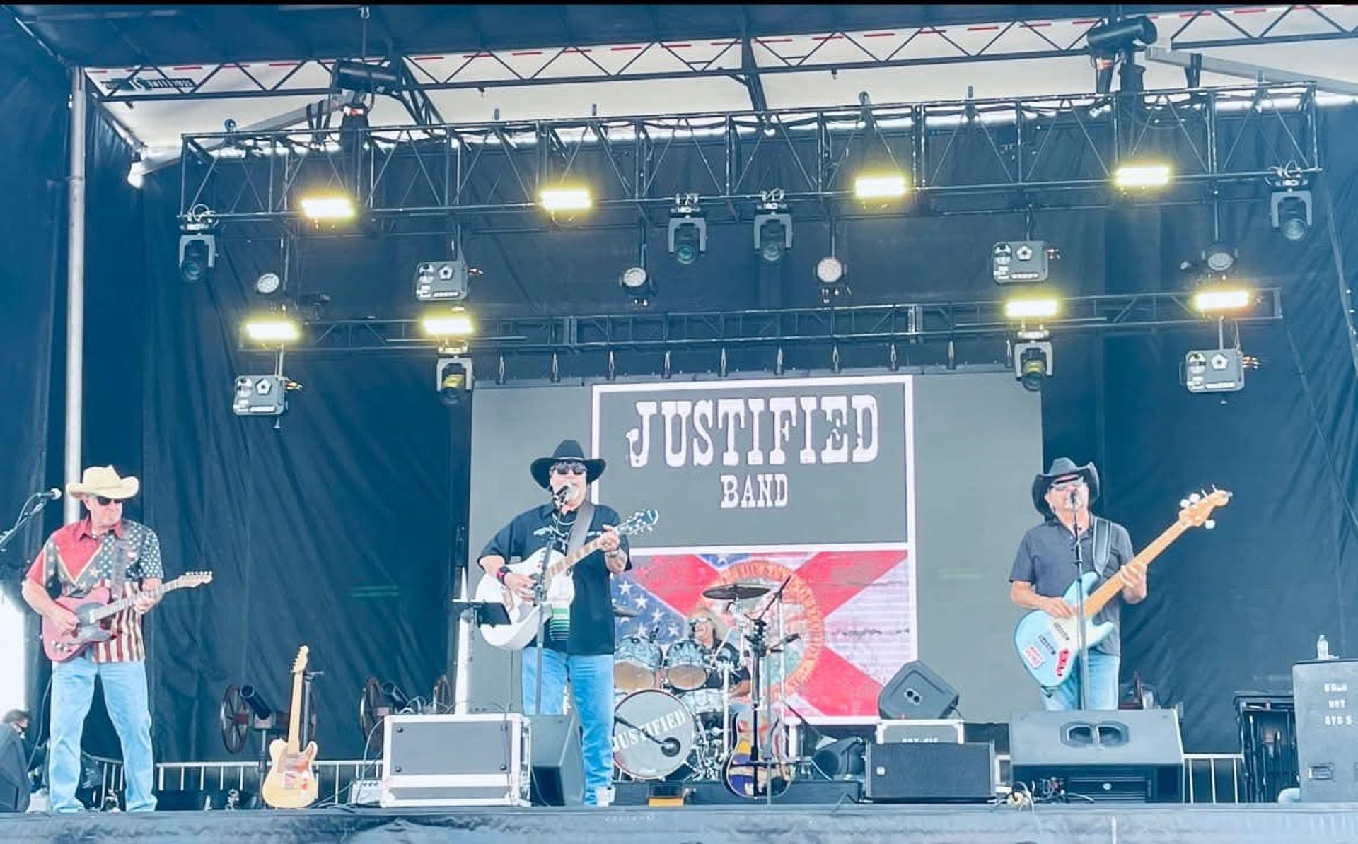 an abstract photo of a curved building with a blue sky in the background