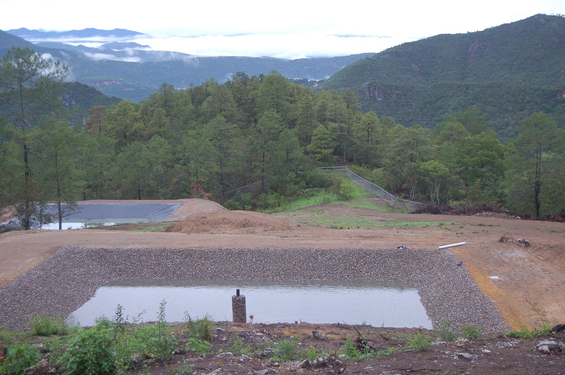 black and brown leather padded tub sofa