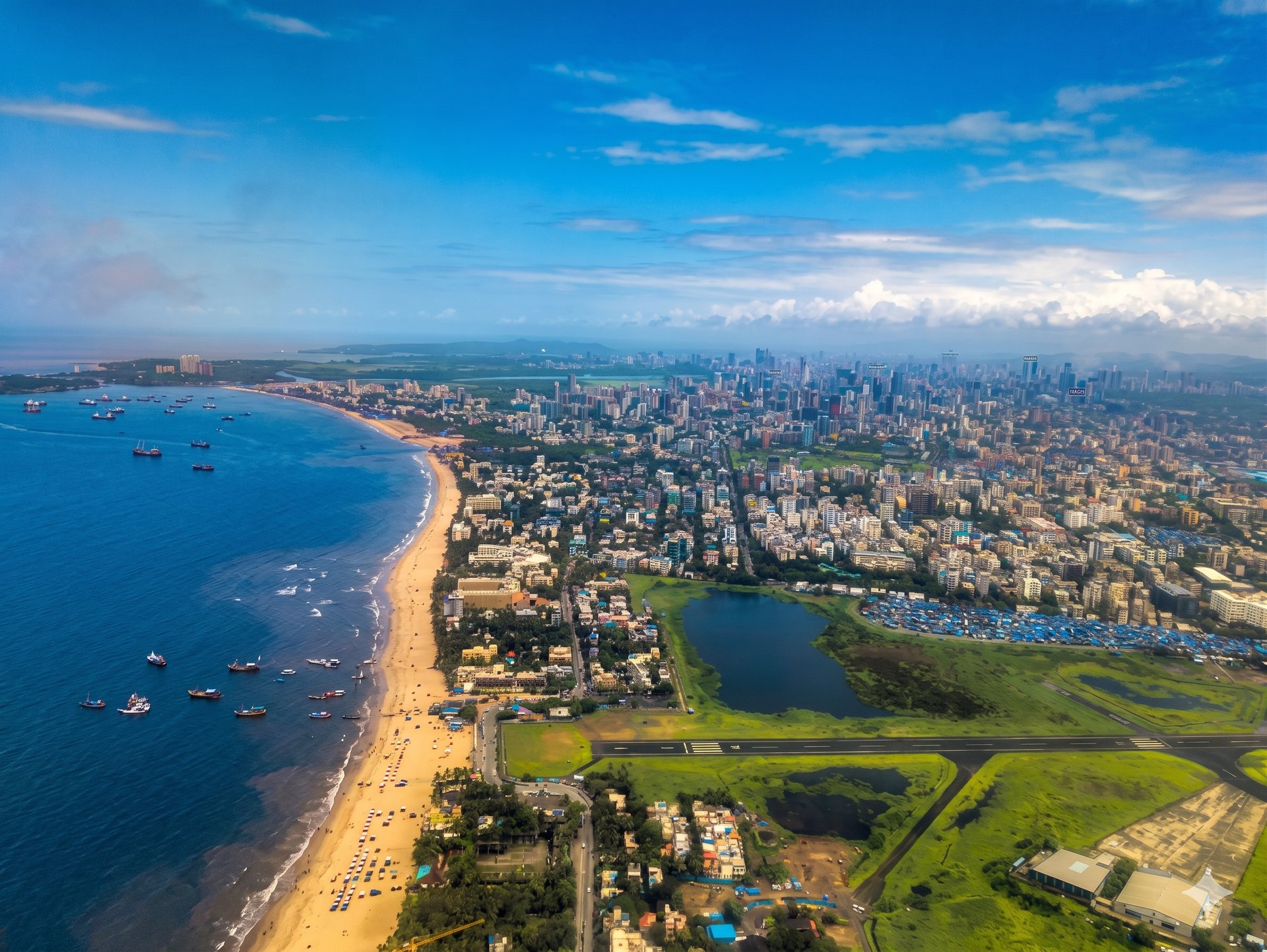 black and brown leather padded tub sofa
