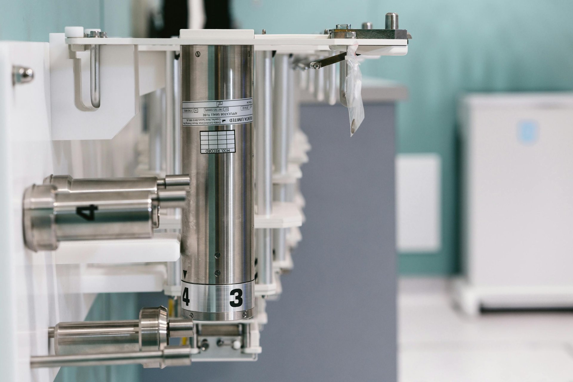 an abstract photo of a curved building with a blue sky in the background