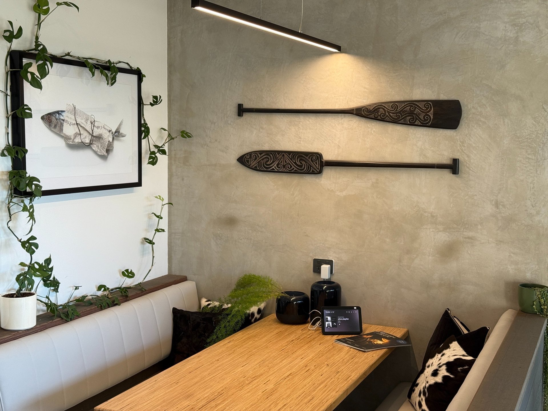 man wearing black jacket holding rod