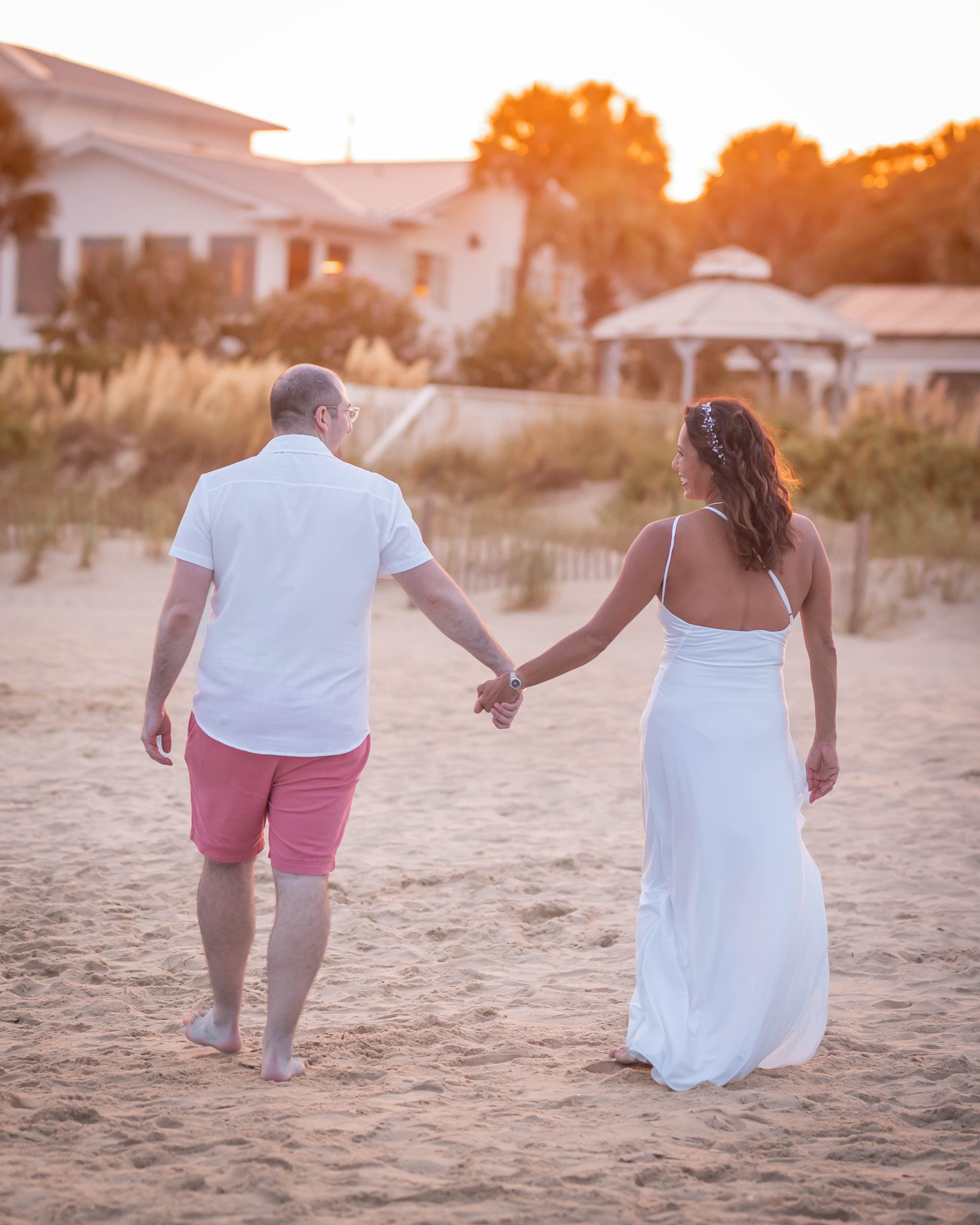 couple wearing silver-colored rings