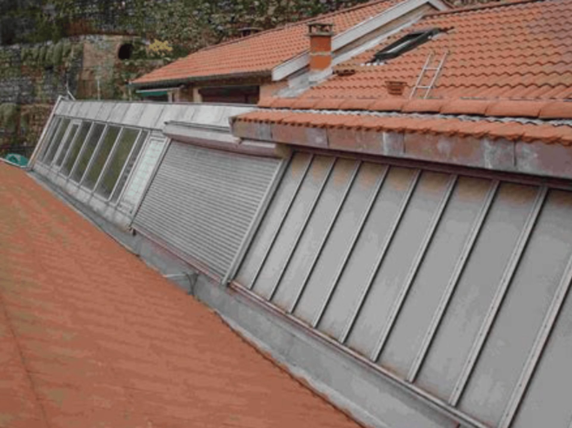 an abstract photo of a curved building with a blue sky in the background