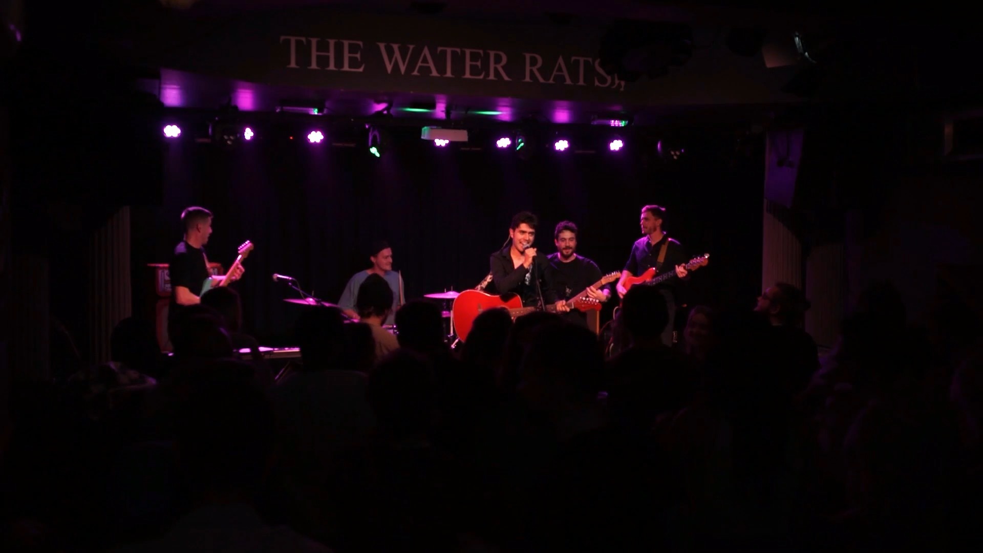 Olly Williams performing live with band at The Water Rats music venue London