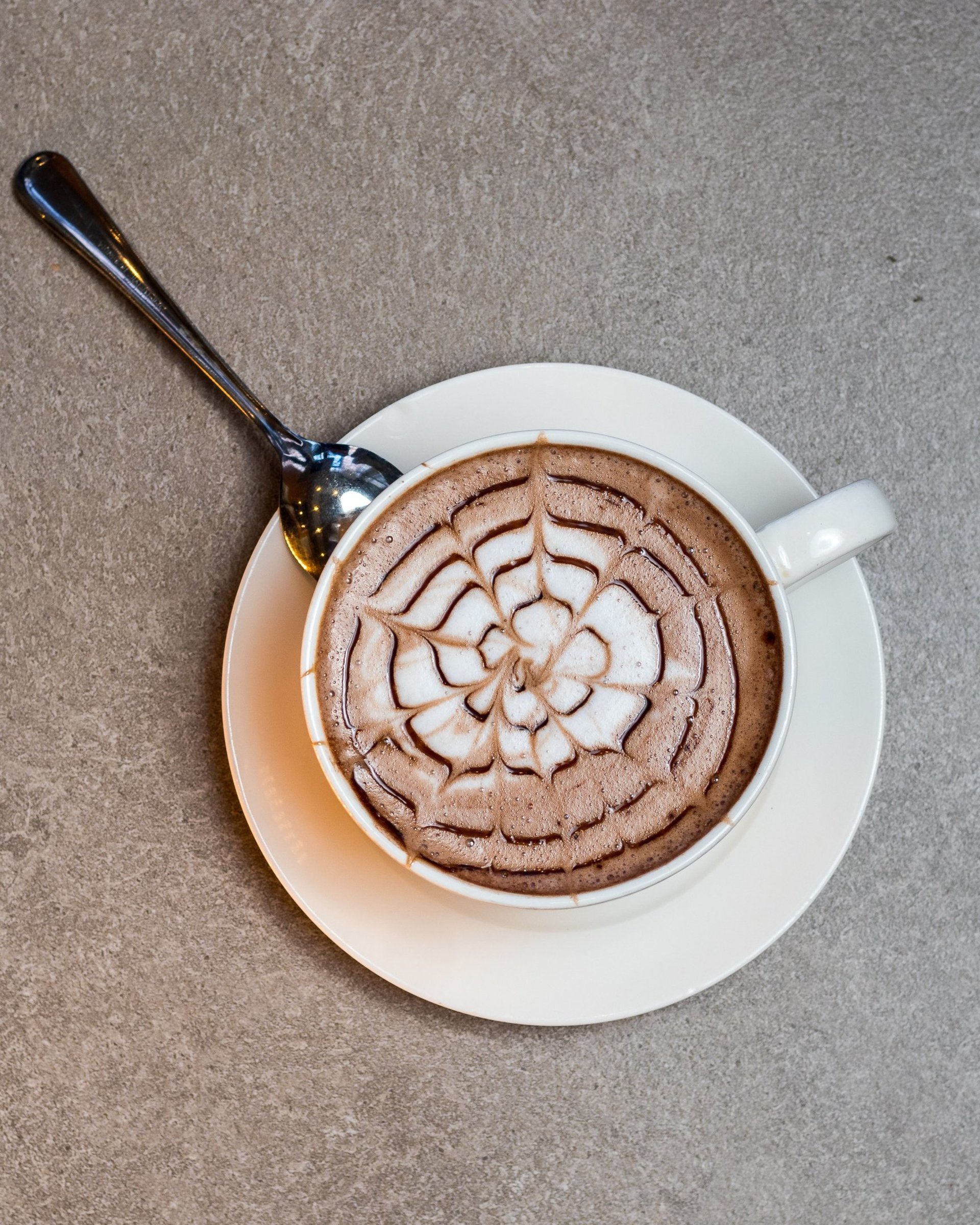 black nikon dslr camera on white printer paper