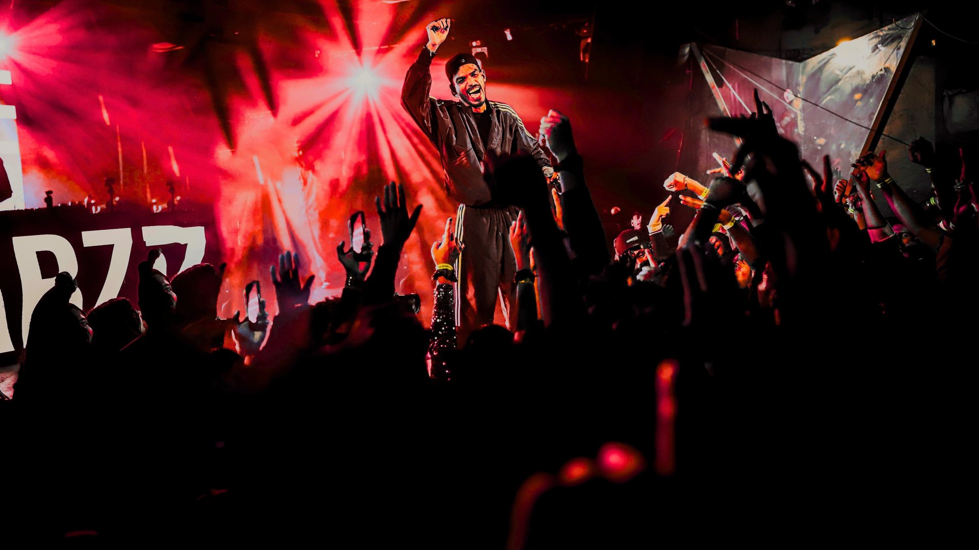 woman singing on stage